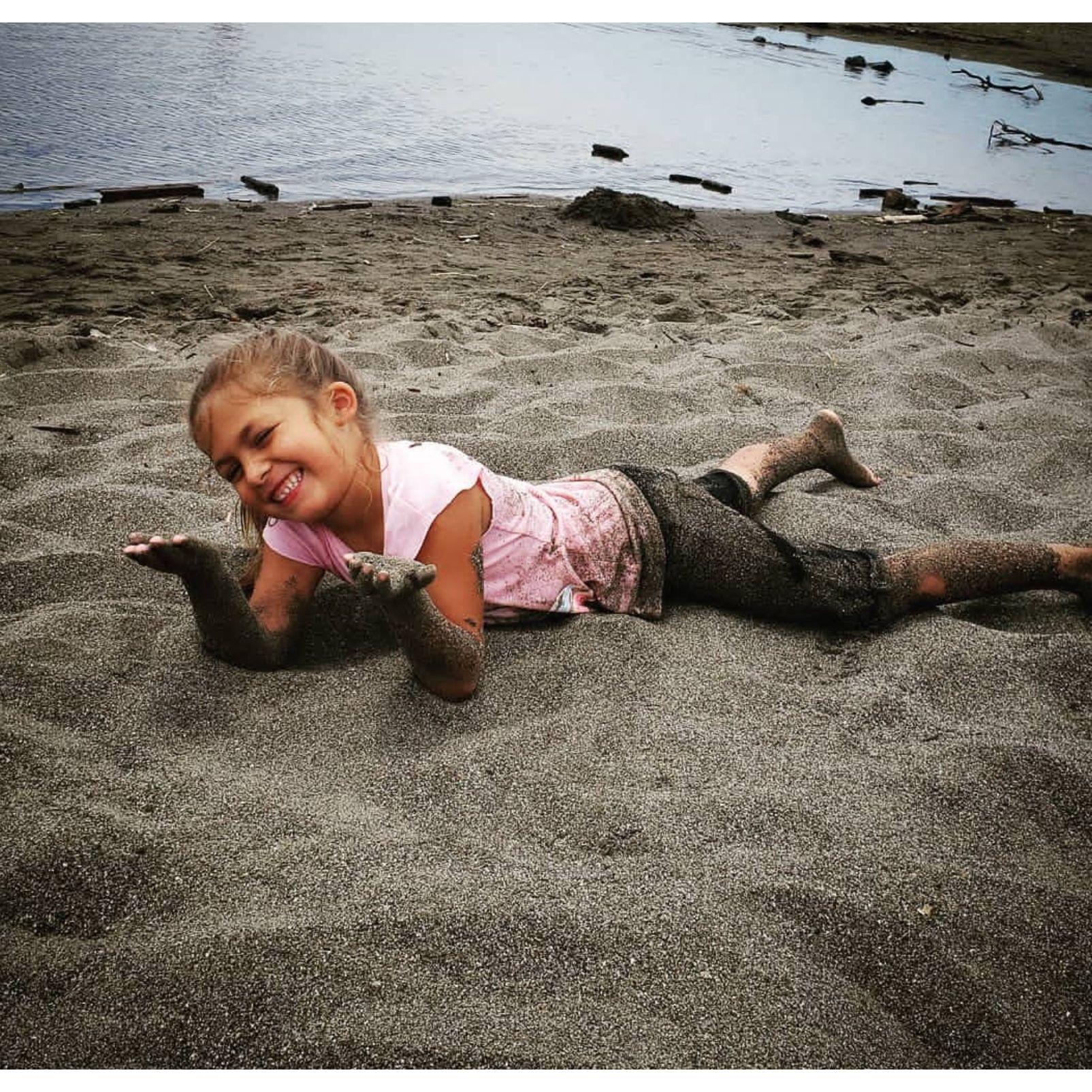 She loves the wet sand!