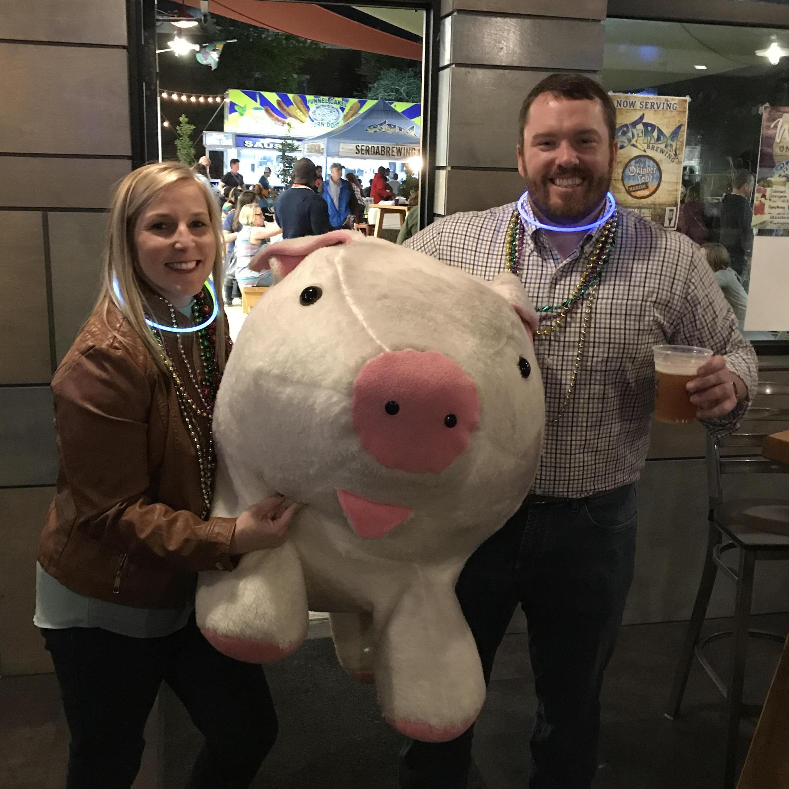 That time at Mardi Gras when Blake caught the world's largest pig (aka Brody's favorite toy)