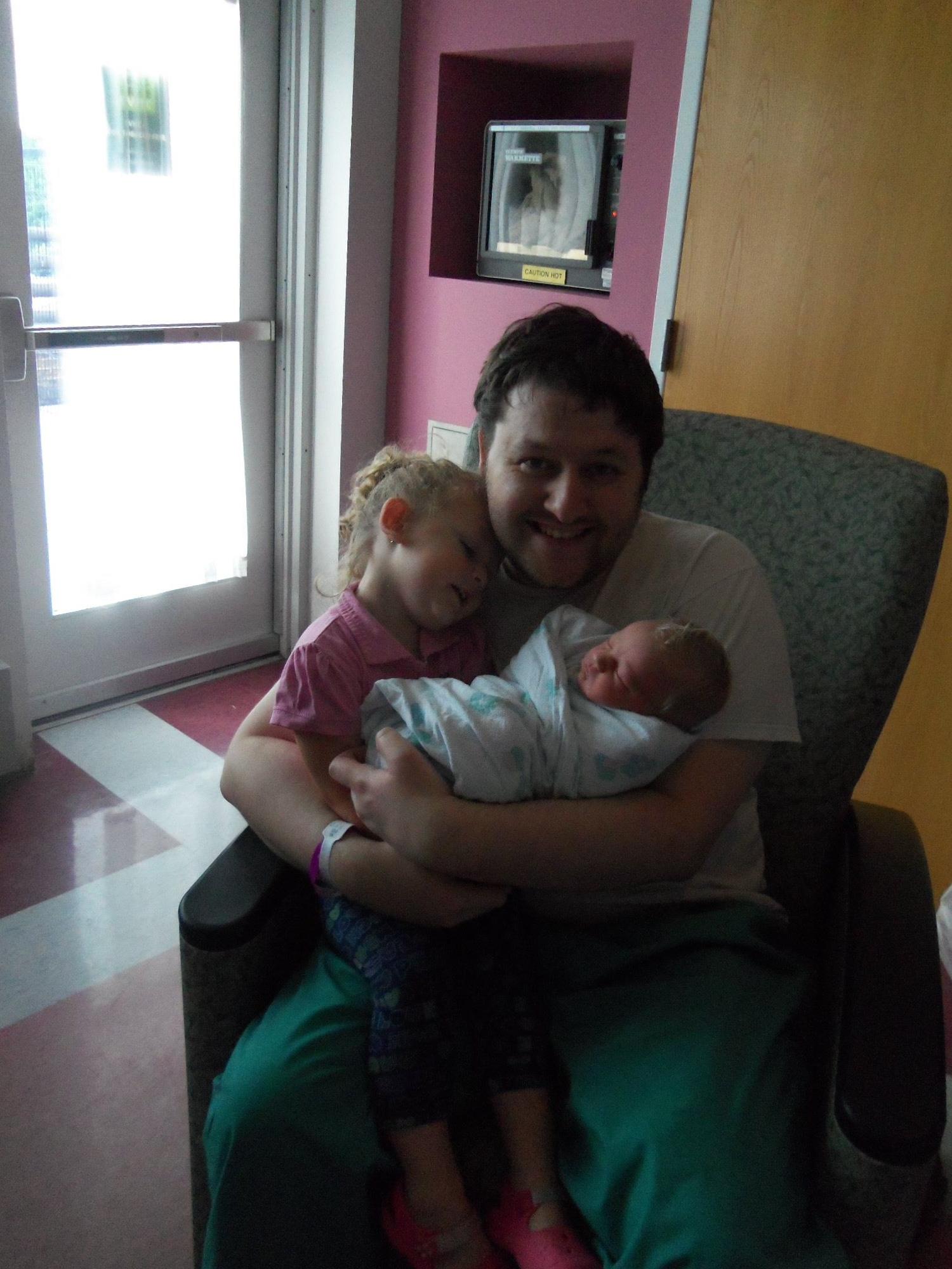 Adam and Zoey the day Oliver was born.