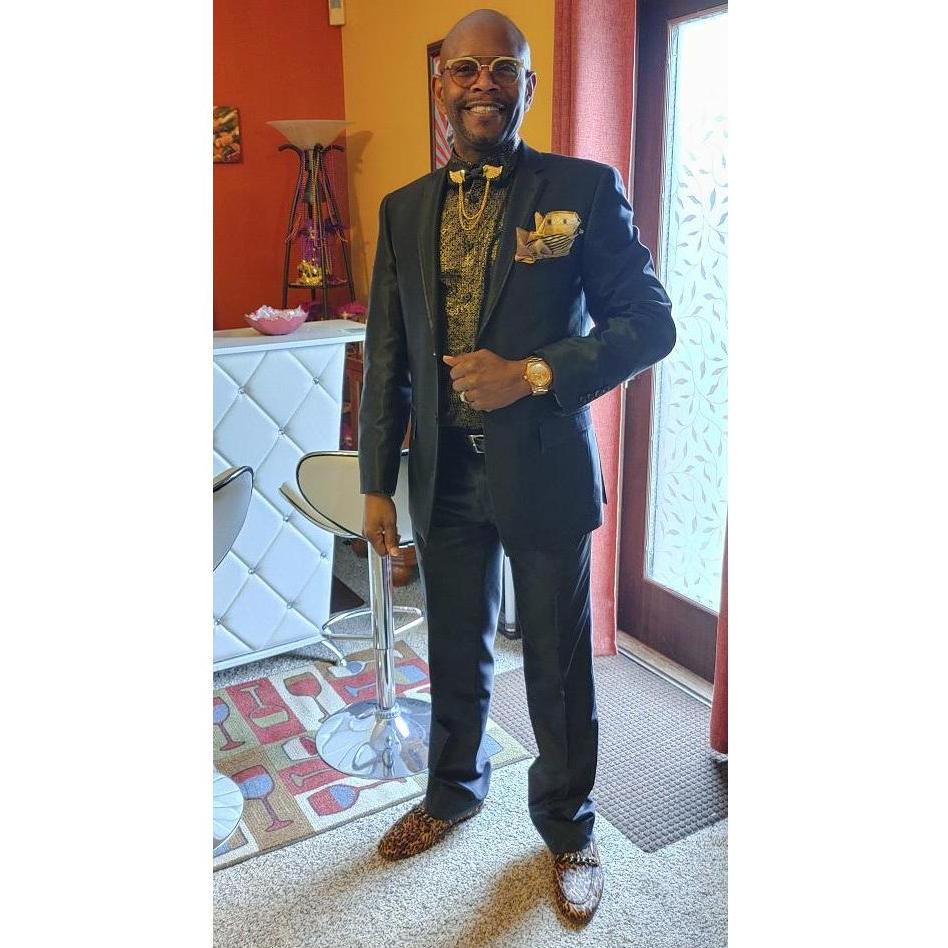 Sunday church attire:  Blk w/gold winged Bowtie and Leopard printed shoes.