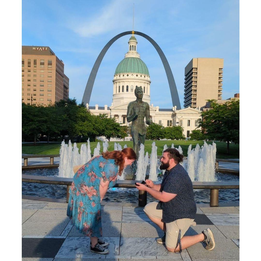 The moment Mike proposed to Emma in STL w/ the help of our best friends, Regan and Caleb.