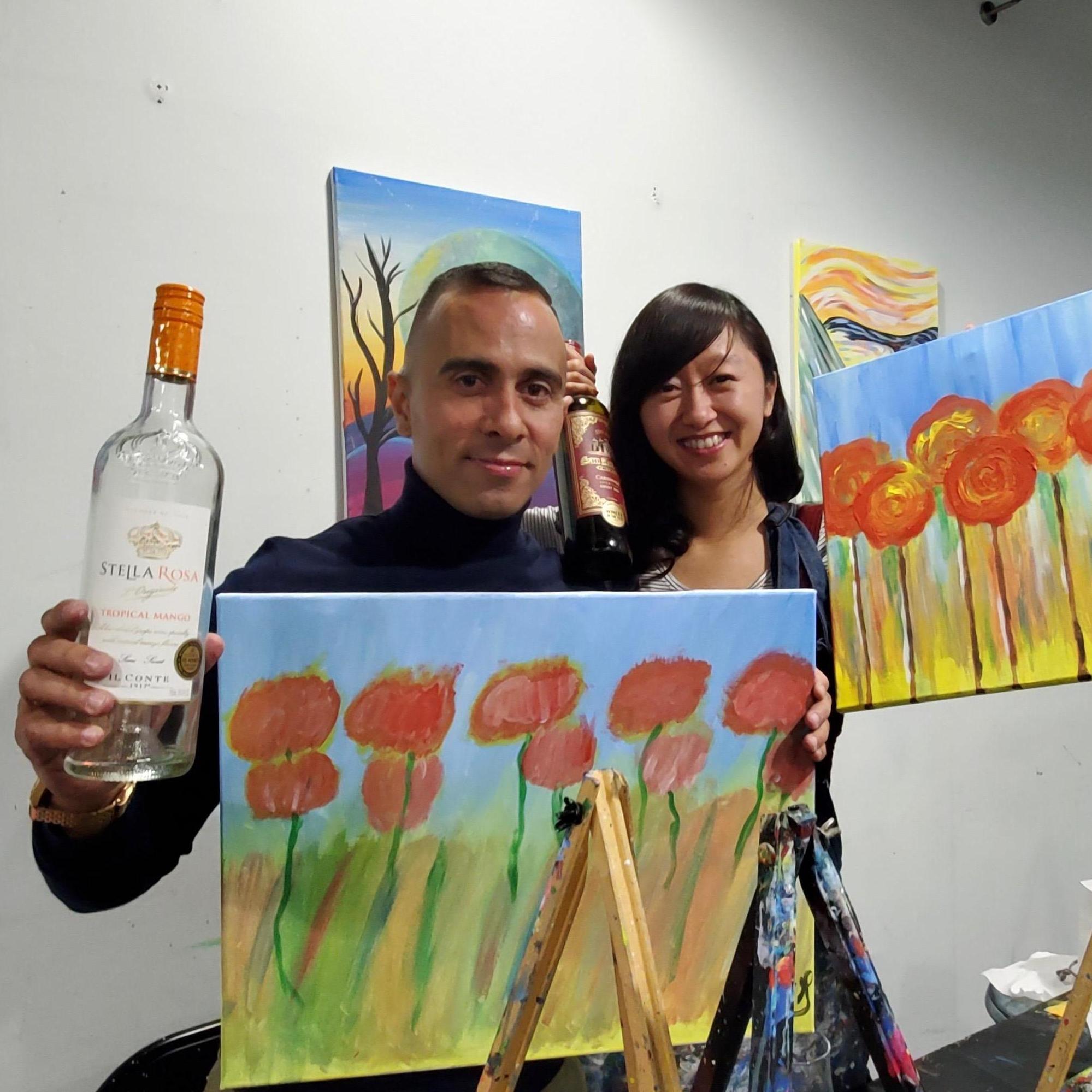 These canvases change colors to reveal a beautiful image when you pour wine on them... But don't quote me, I was pretty wasted on the Stella.