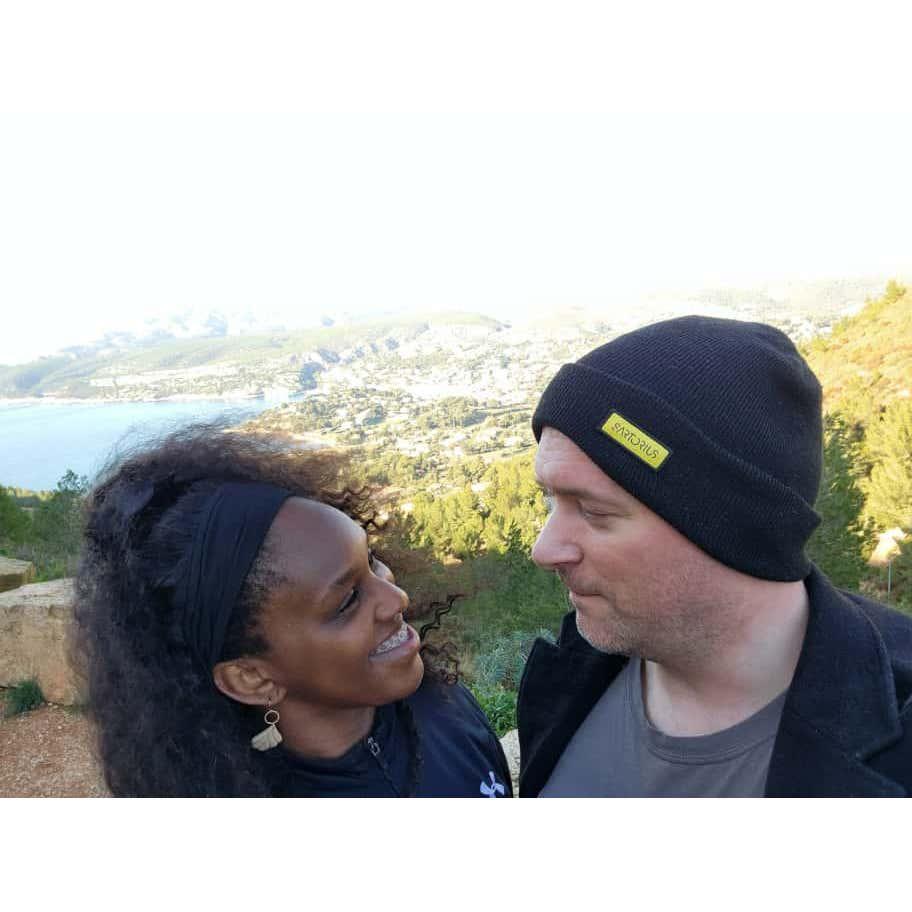 Dennis favorite's pose. They had just finished hiking and Michelle was getting hangry despite smiling.