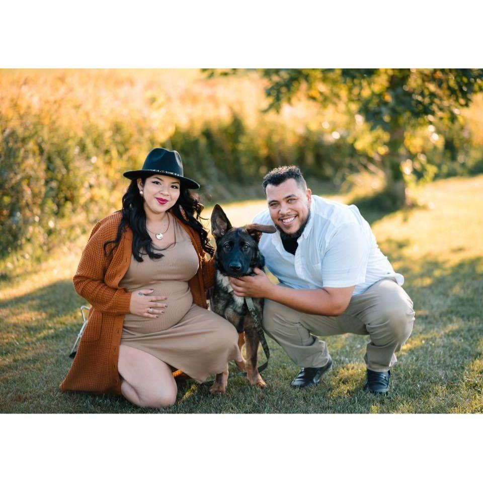 Our maternity photoshoot that included our big fur baby Buddy