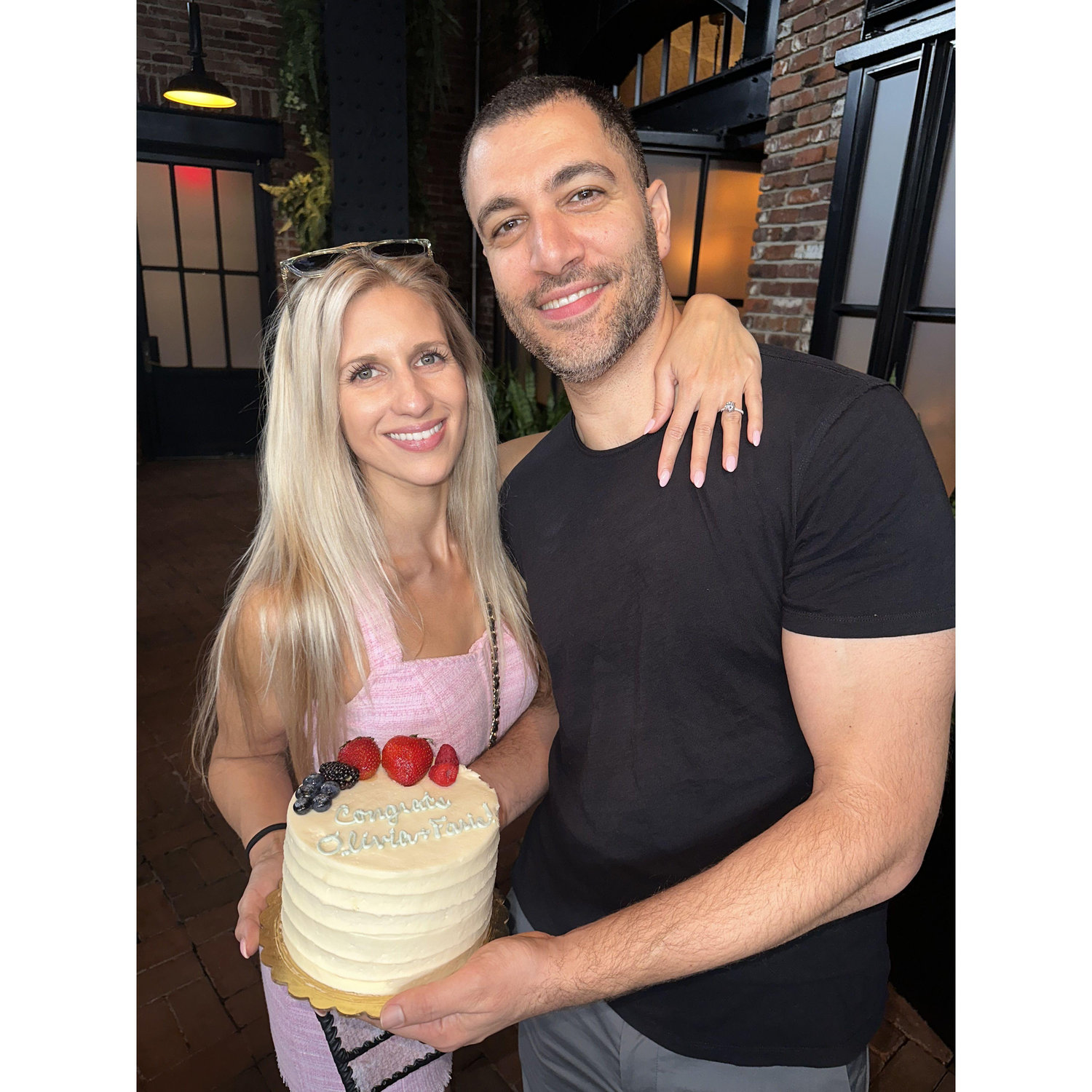 The day of their engagement party, aka Olivia's last official day in New York