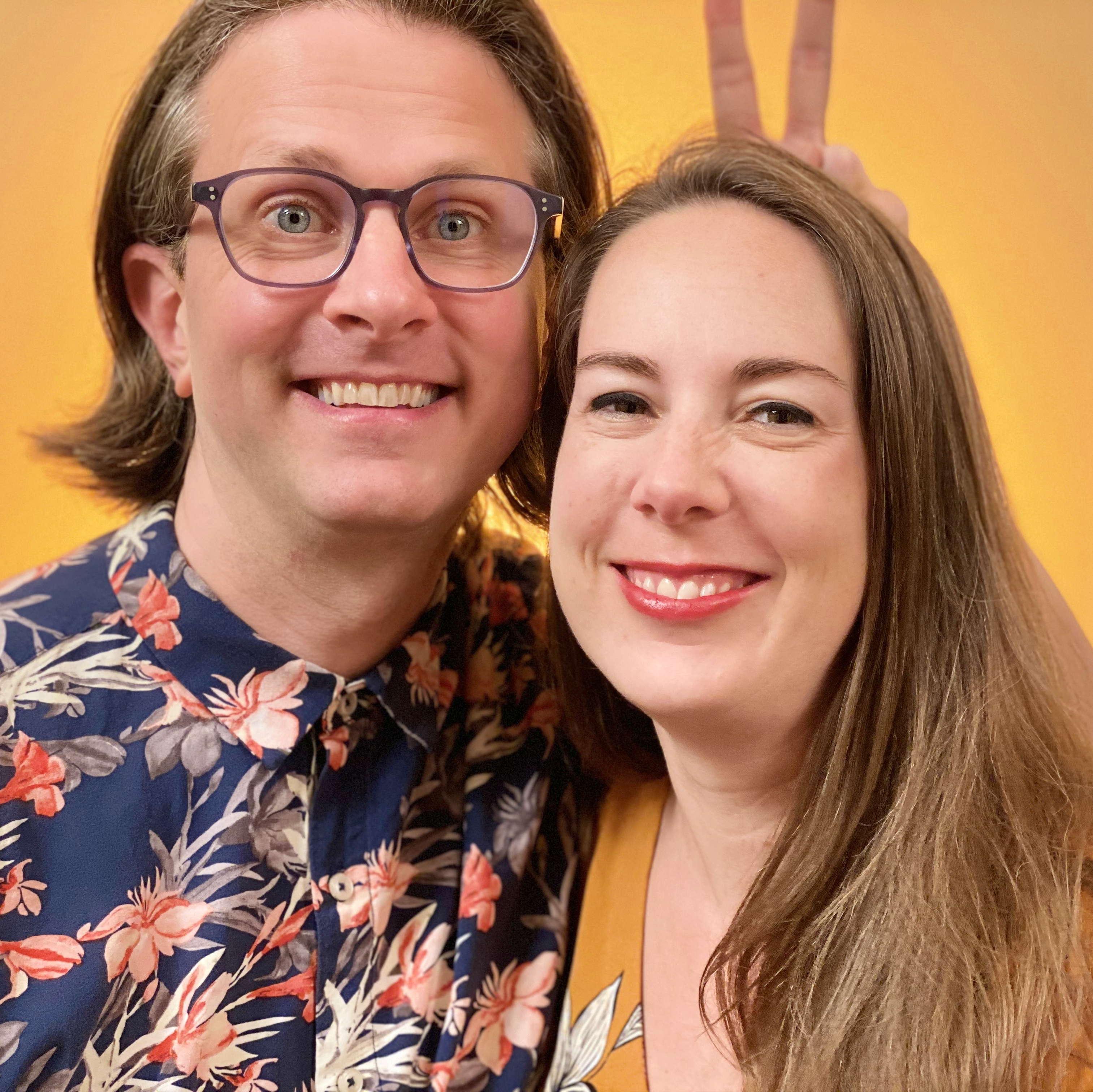 James giving Ruth bunny-ears during a photo shoot selfie.