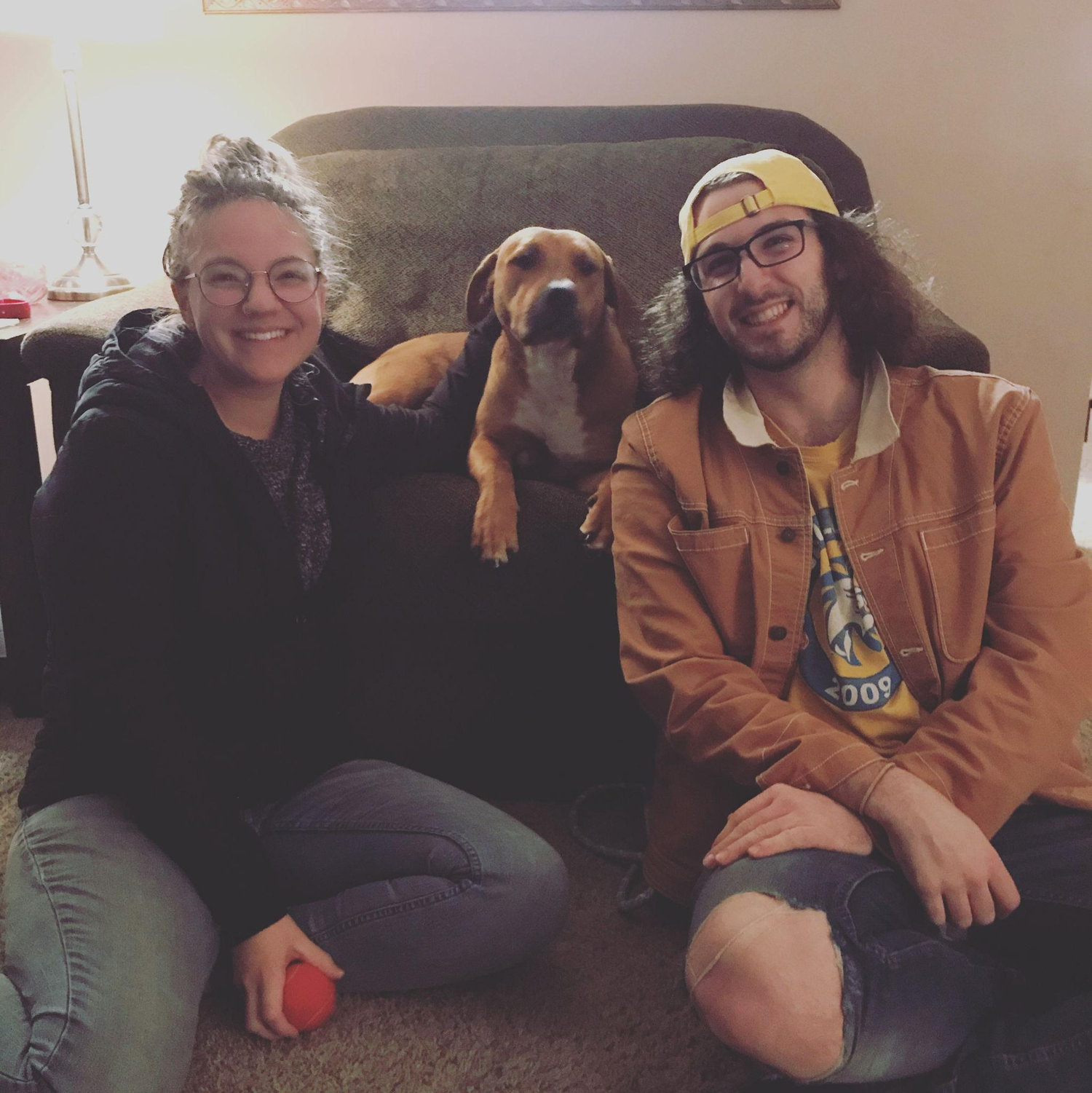 The night we brought Benny home - very typical of us to be sitting on the ground while our dog is on the couch!