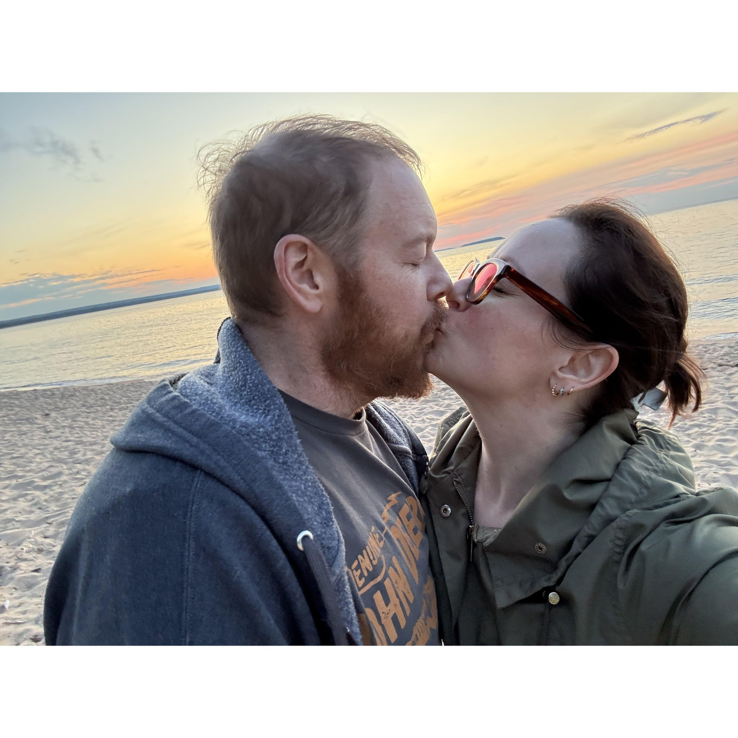 Sunset kiss celebrating our engagement