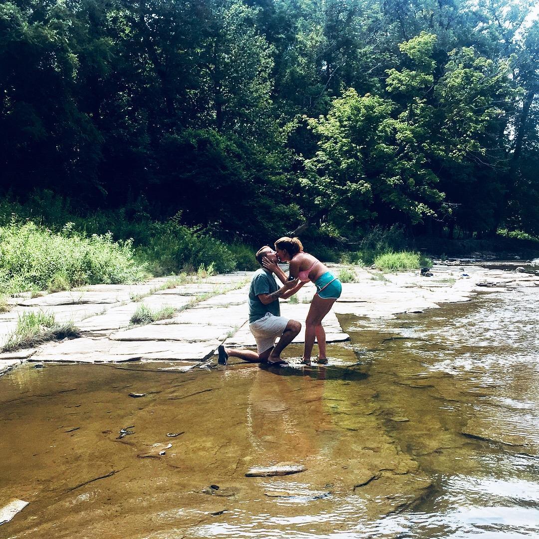 On a hike with Brinkley and Sarah's sister on August 6, 2018. When Dave asked Sarah to be his wife!