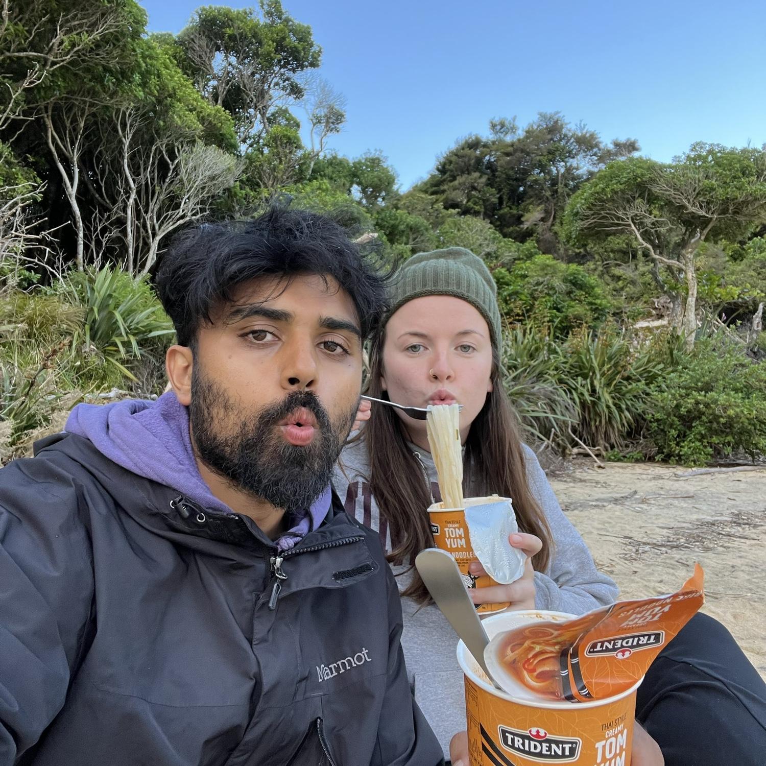 December 2022 - Nelson, New Zealand - Enjoying our camping noodles at Abel Tasman National Park. Moments before the Wekas (birds) went menace mode & forced a defensive battle that would last hours...