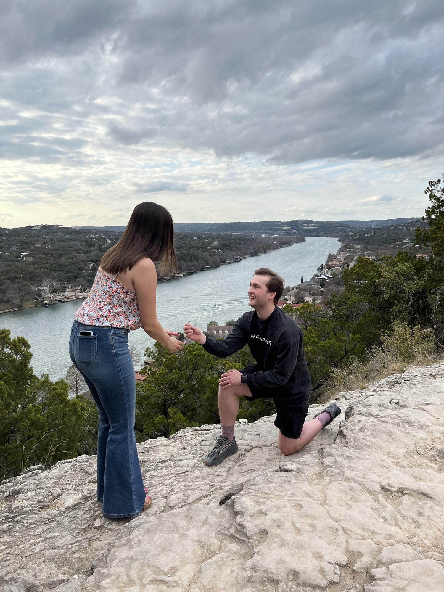 James proposing in Austin, Texas at Mount Bonnell ❤️