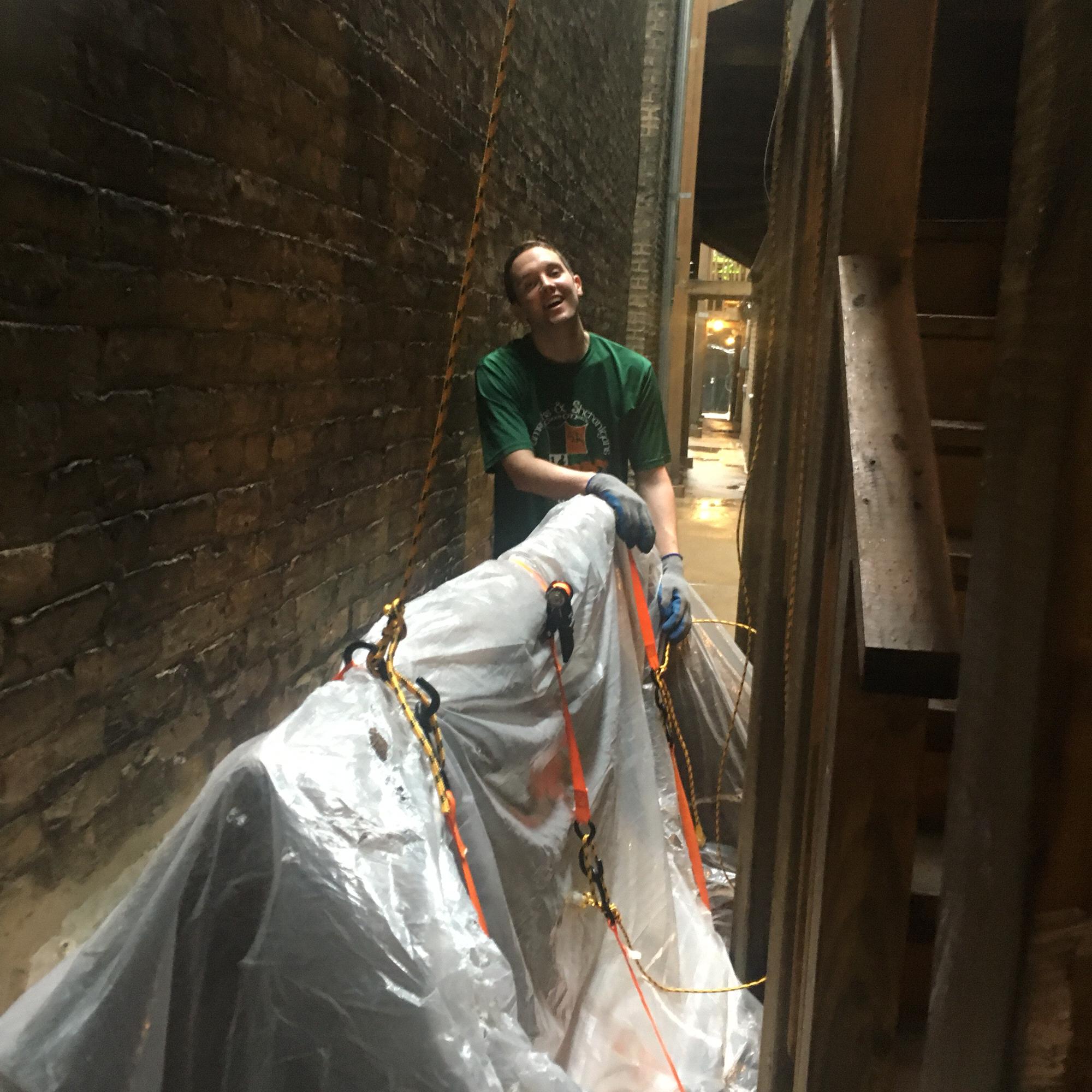 Getting the infamous couch out of our apartment.