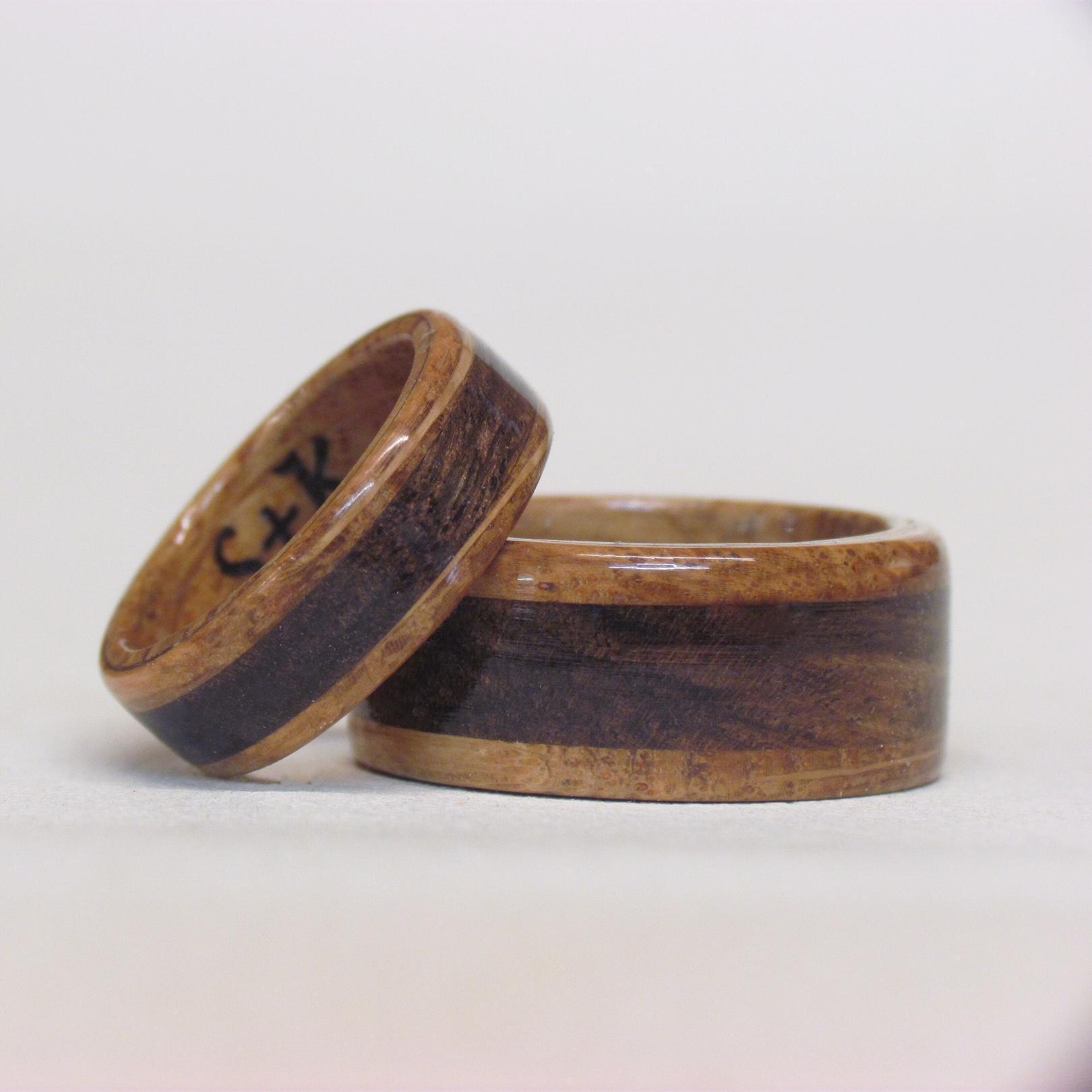 Our engagement rings, engraved with our initials.
