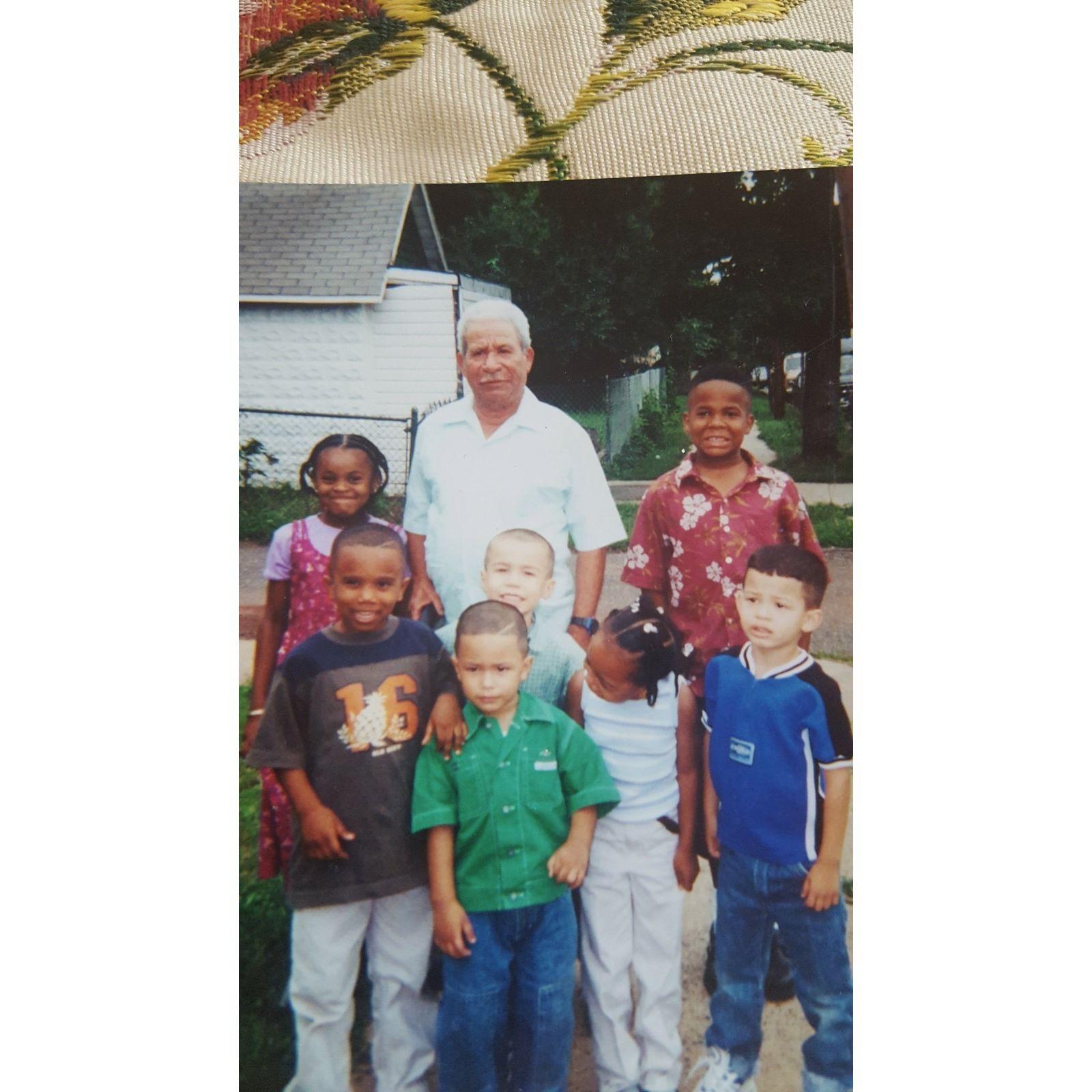 childhood photo of the groom and more family members