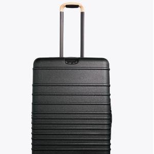 The Medium Check-In Roller in Black