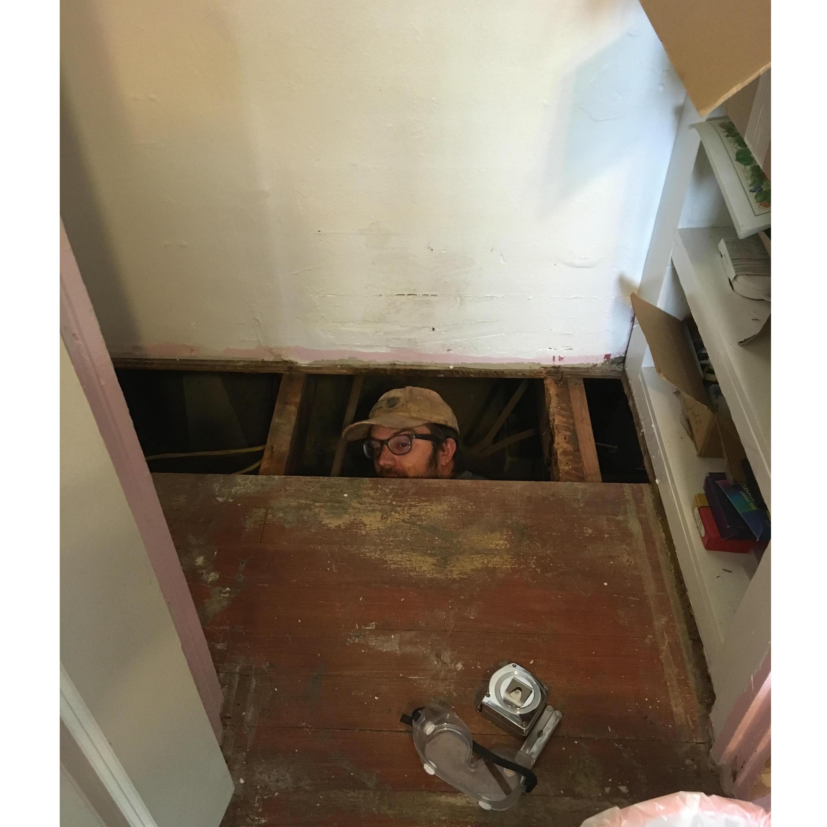 Jeff hard at work renovating our house