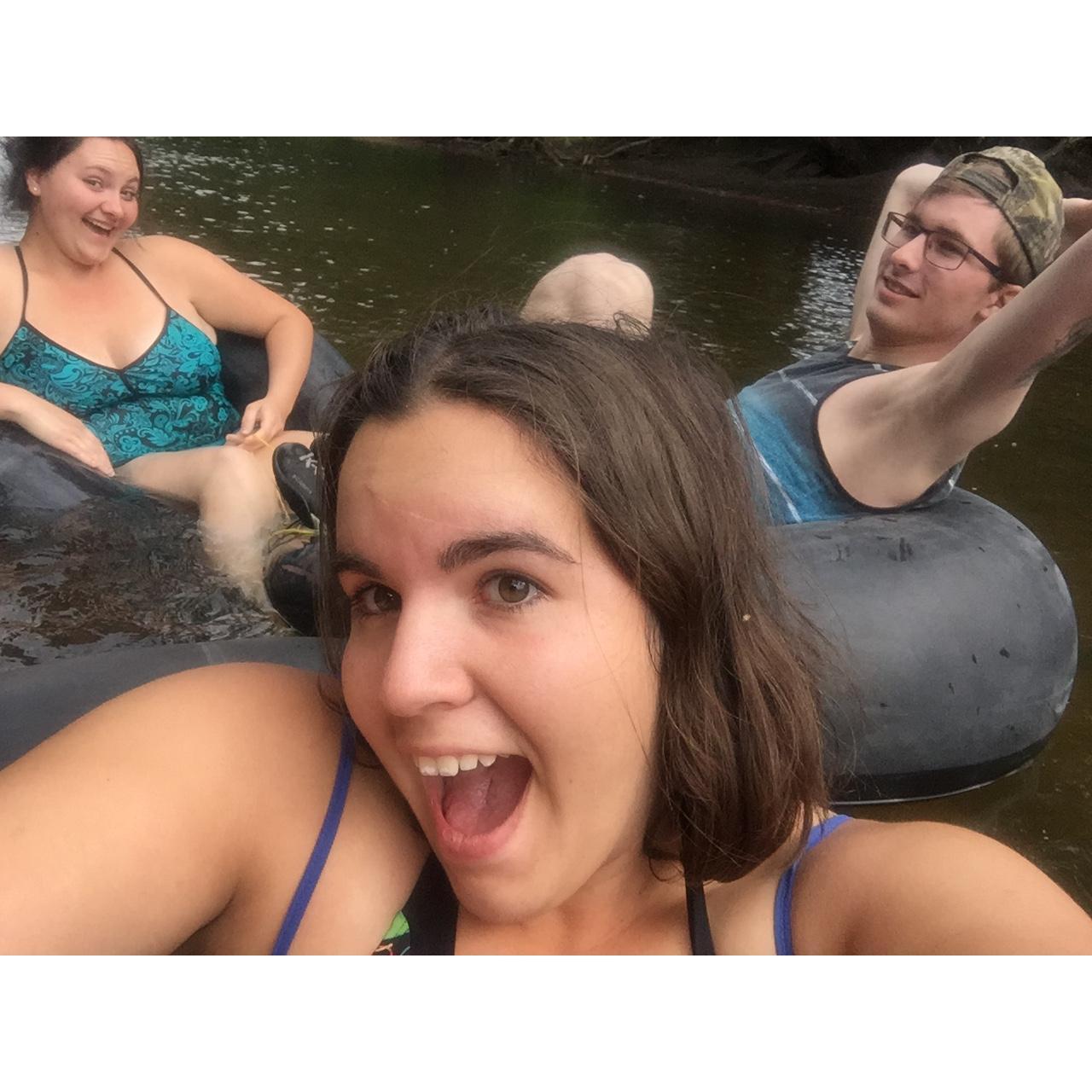 We go tubing down the Poudre River every summer by our house always fun. Ron gets cold fast normally as you can tell by his face.