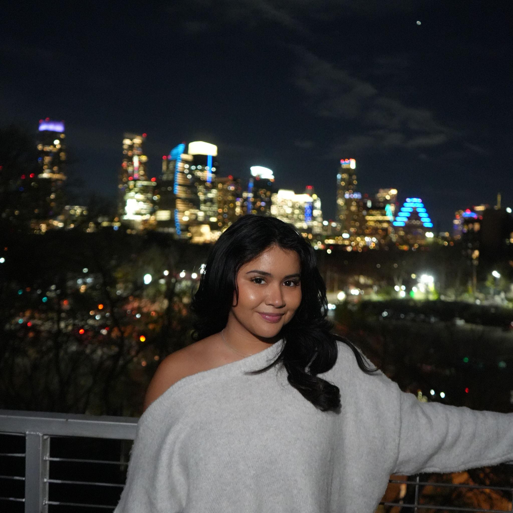 1/2/26: Nate told Jackie they needed to take more pictures with the skyline but at night... little did she know! This was minutes before it happened!