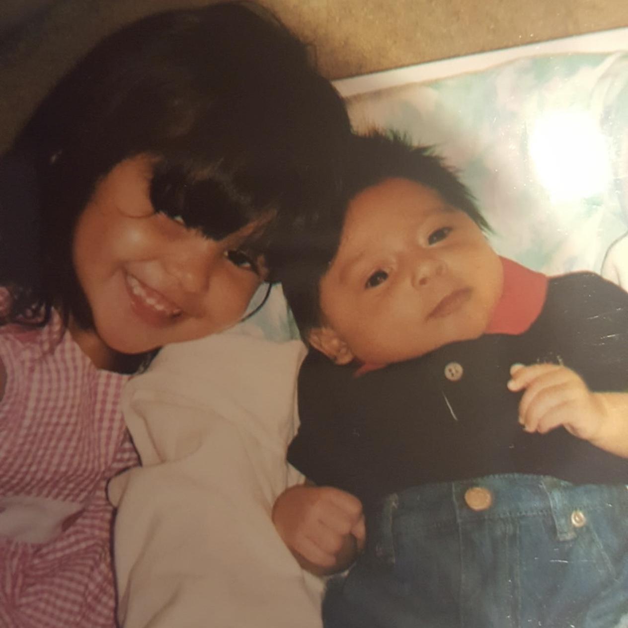 The groom and his sister when he came home