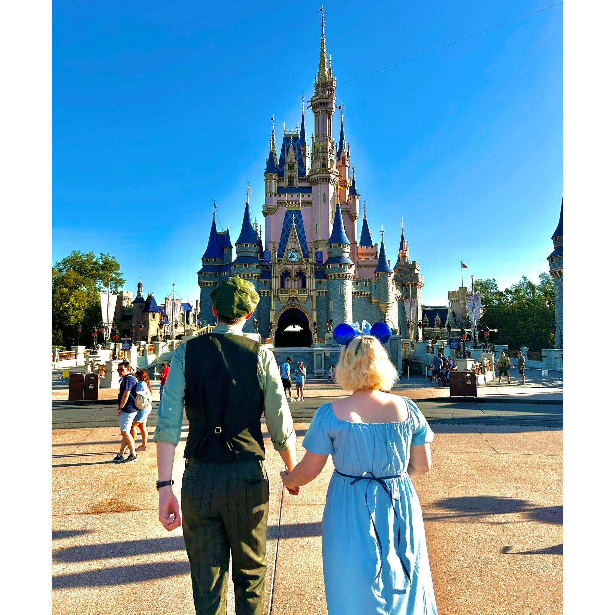 Dylan and Morgan in front of Cinderella's Castle at the Magic Kingdom. This was their first big trip away together!