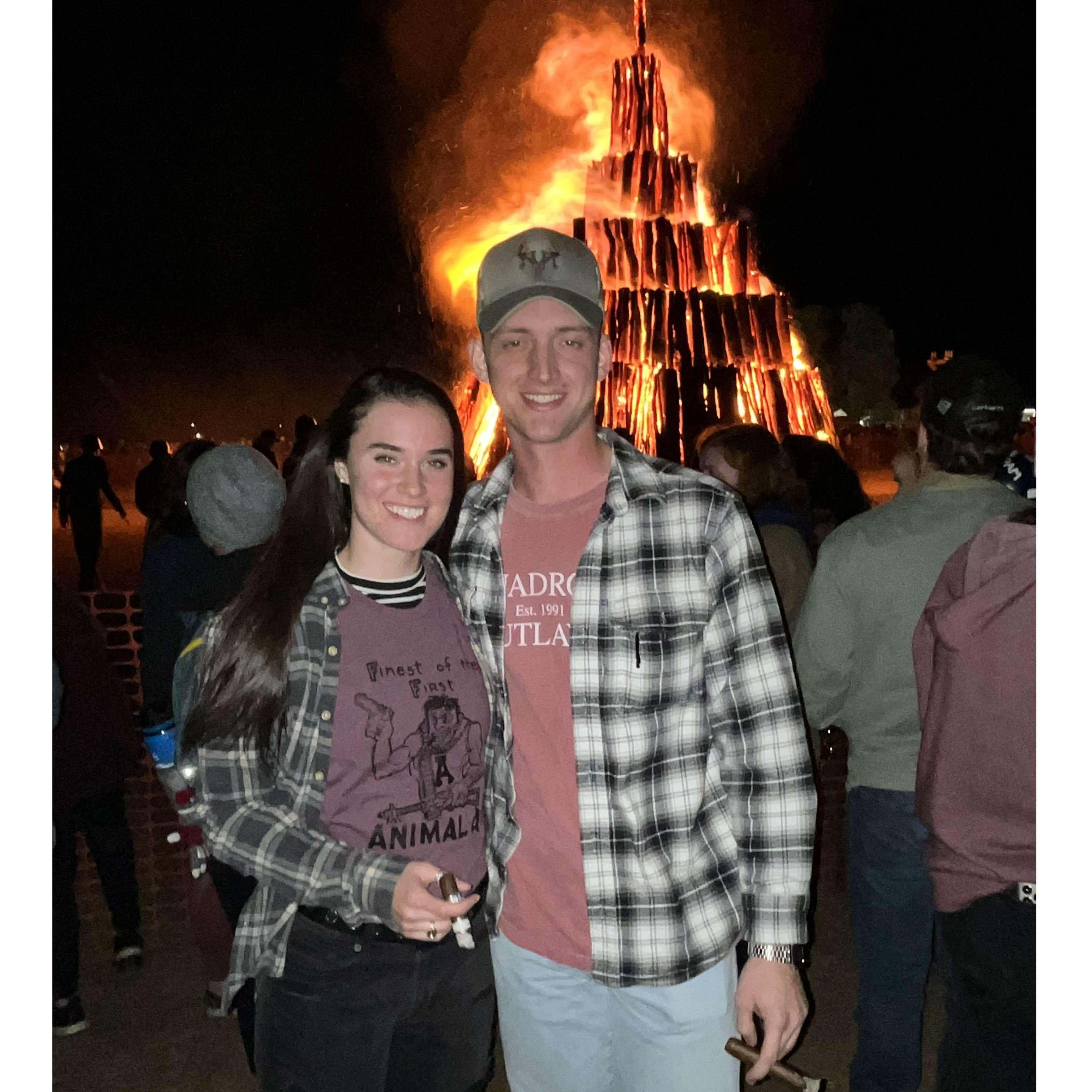 In this photo, we're standing in front of Aggie Bonfire (kinda cult-y, we know)! As you can maybe tell, it gets super hot! Thankfully, it was cold that night!
