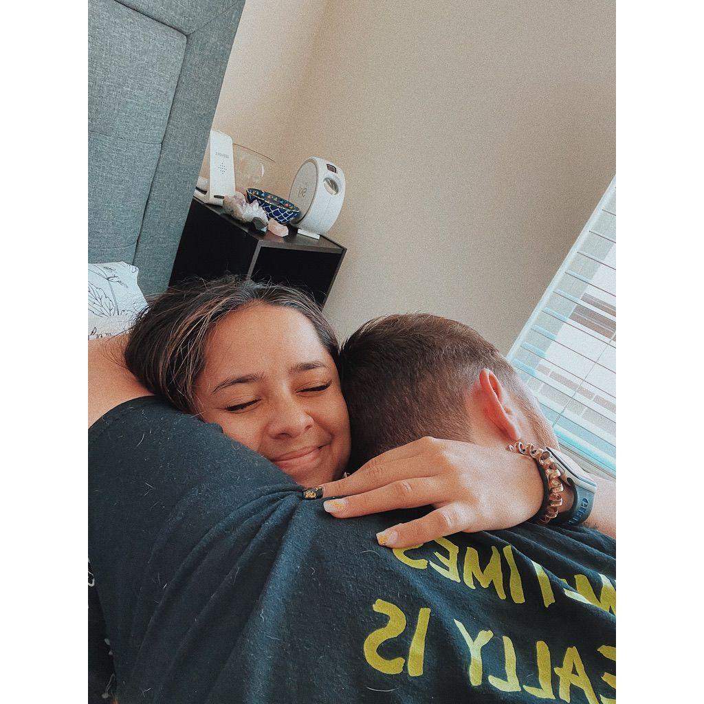 Long Distance Dies! First snuggle in our first apartment together. June 2021.