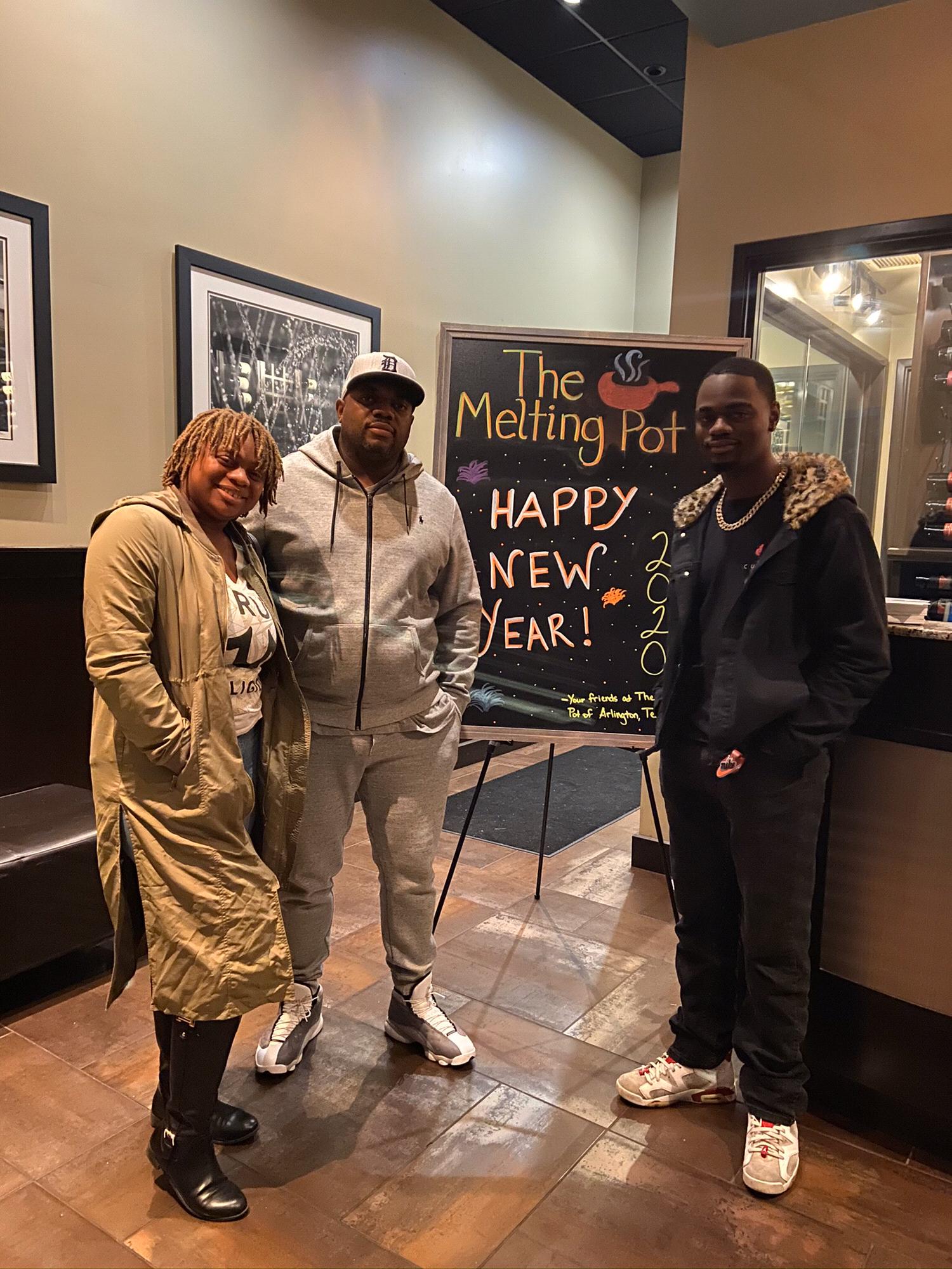 Kyla, Dad, and Lester when dad treated them for their birthdays