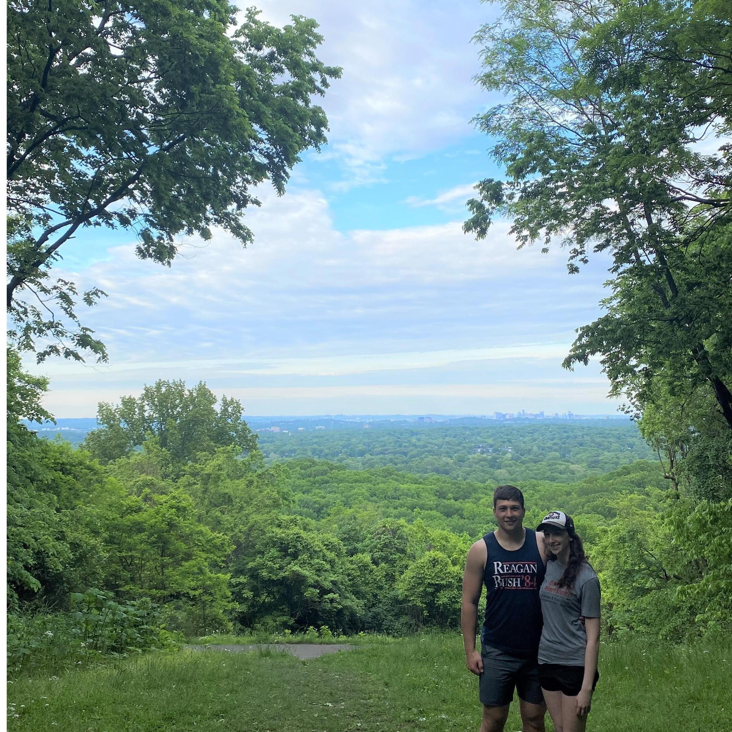 Hiking at our favorite overlook, 7 months before we got engaged in the same location!