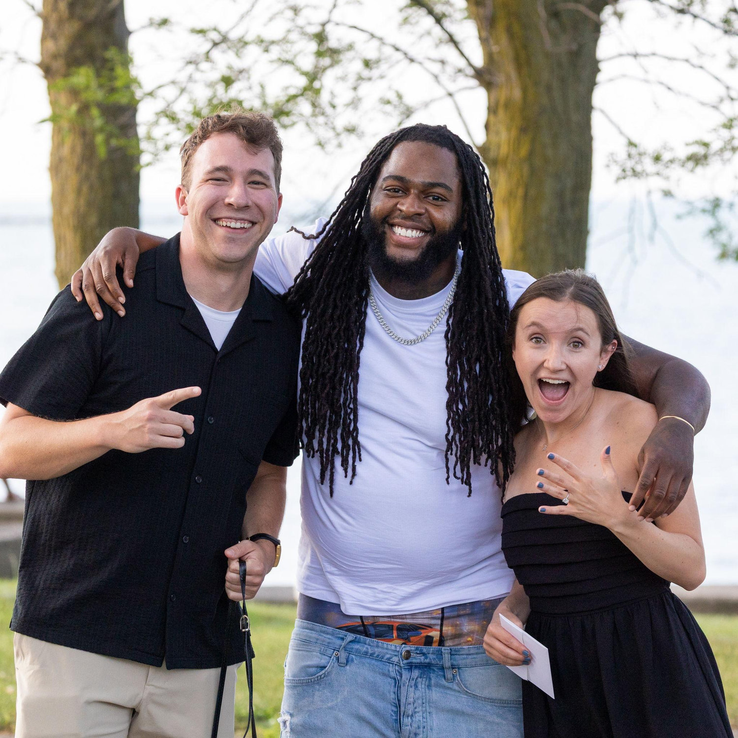 The first person to congratulate us on our engagement - a random stranger at Milton Olive Park near Navy Pier! He insisted our photographer take this photo LOL