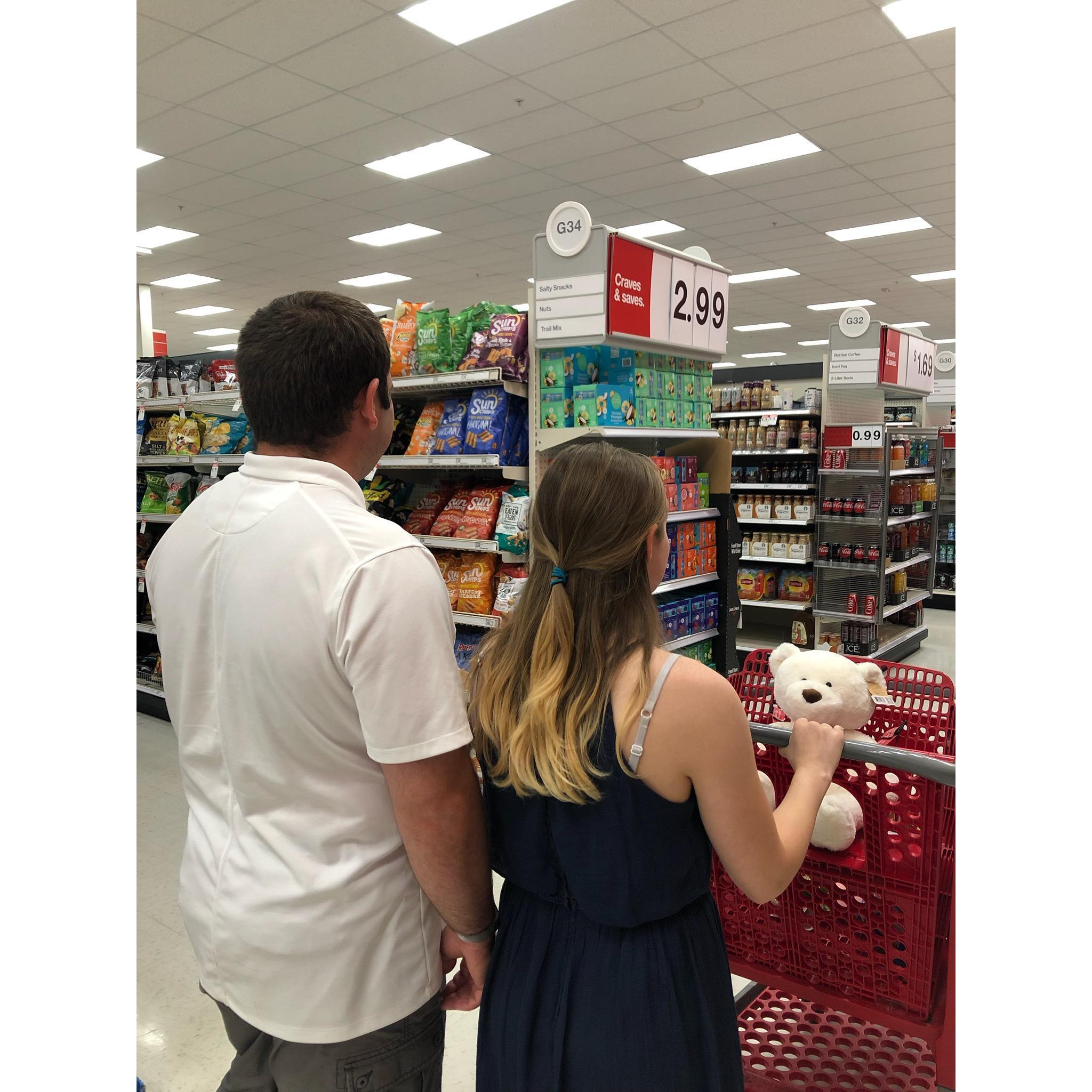 Future Mr. and Mrs. taking a stroll around Target.