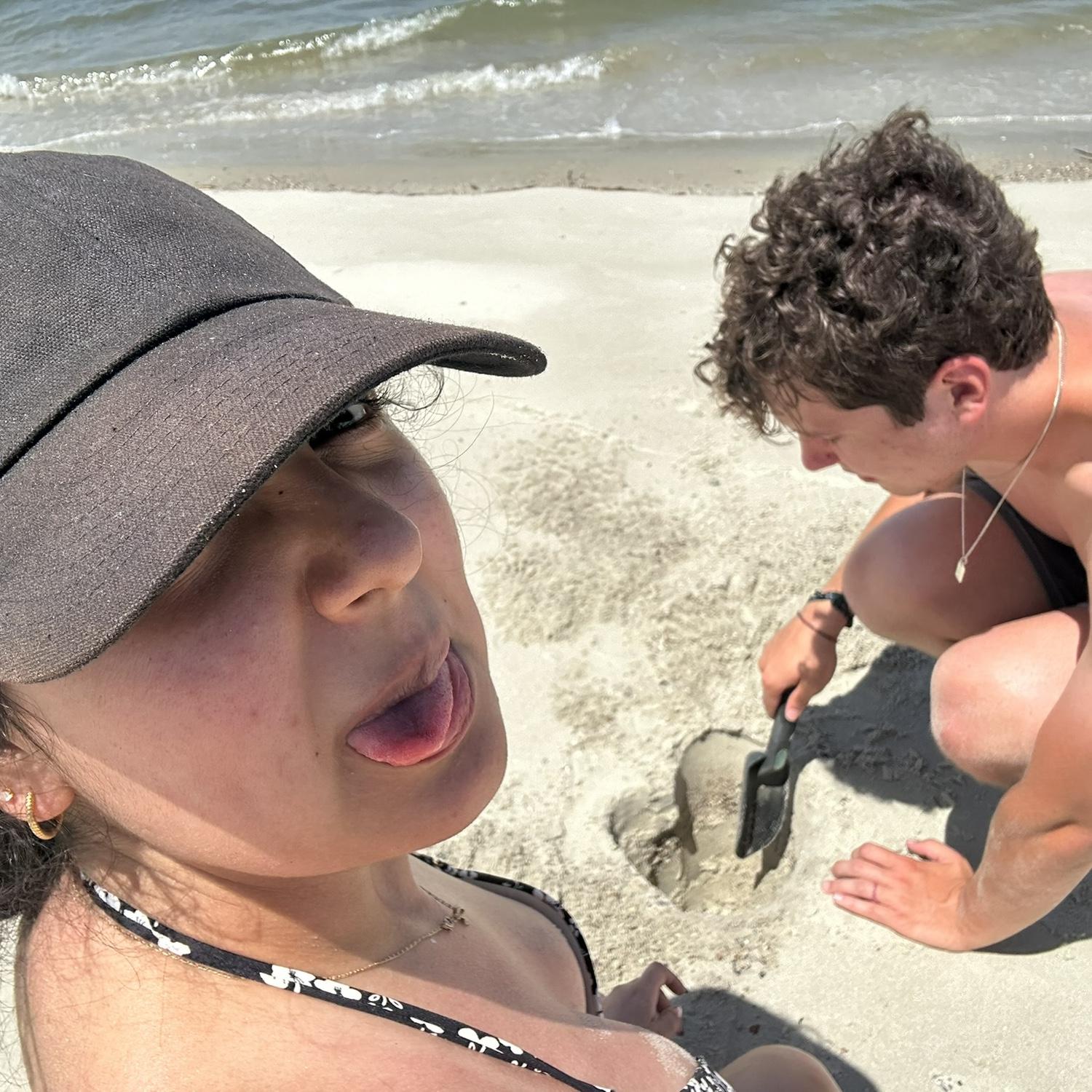 Britton trying to make a cute heart in the sand (Savannah,GA)