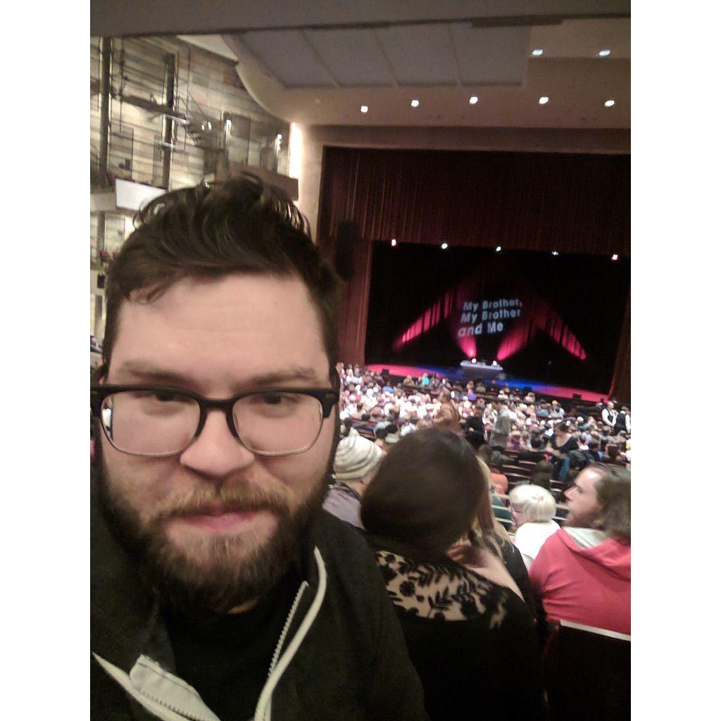 Technically our first pic together. Glenn saw me at the My Brother, My Brother, and Me show and then found me on Tinder. If you zoom in and squint, I'm with my friends in matching baseball tees.