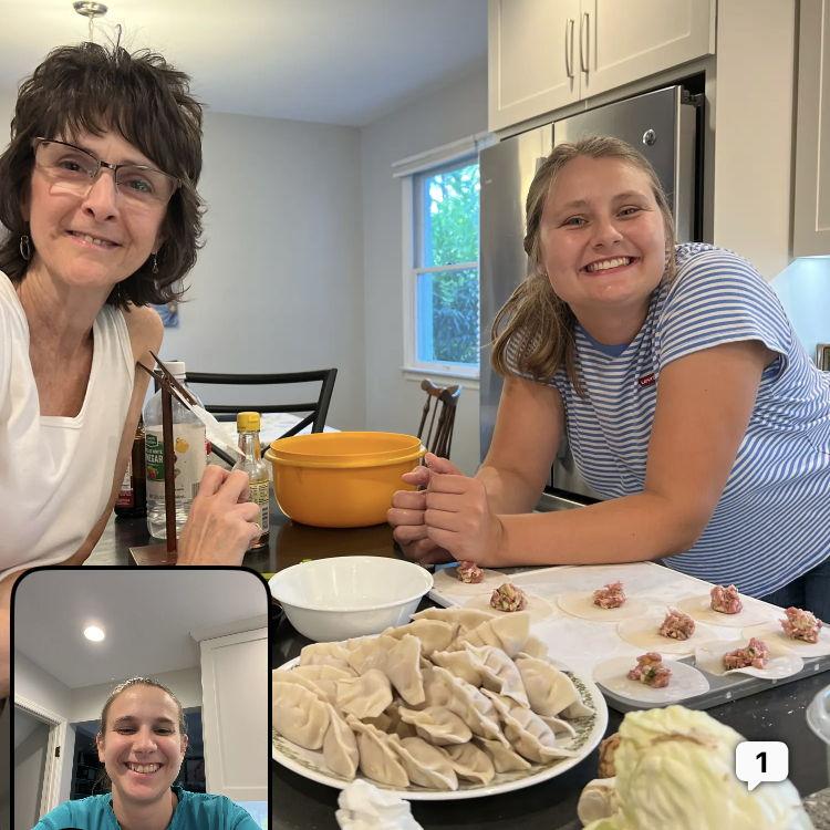 Showing Alli's mom how to make dumplings