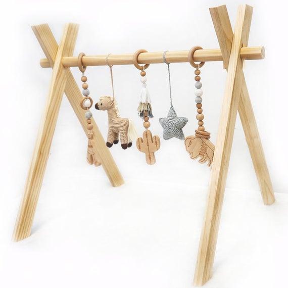 Wooden Play Gym for Baby Wild West Adventures with 5 Natural Wooden Montessori Mobile Crochet Toys Frame