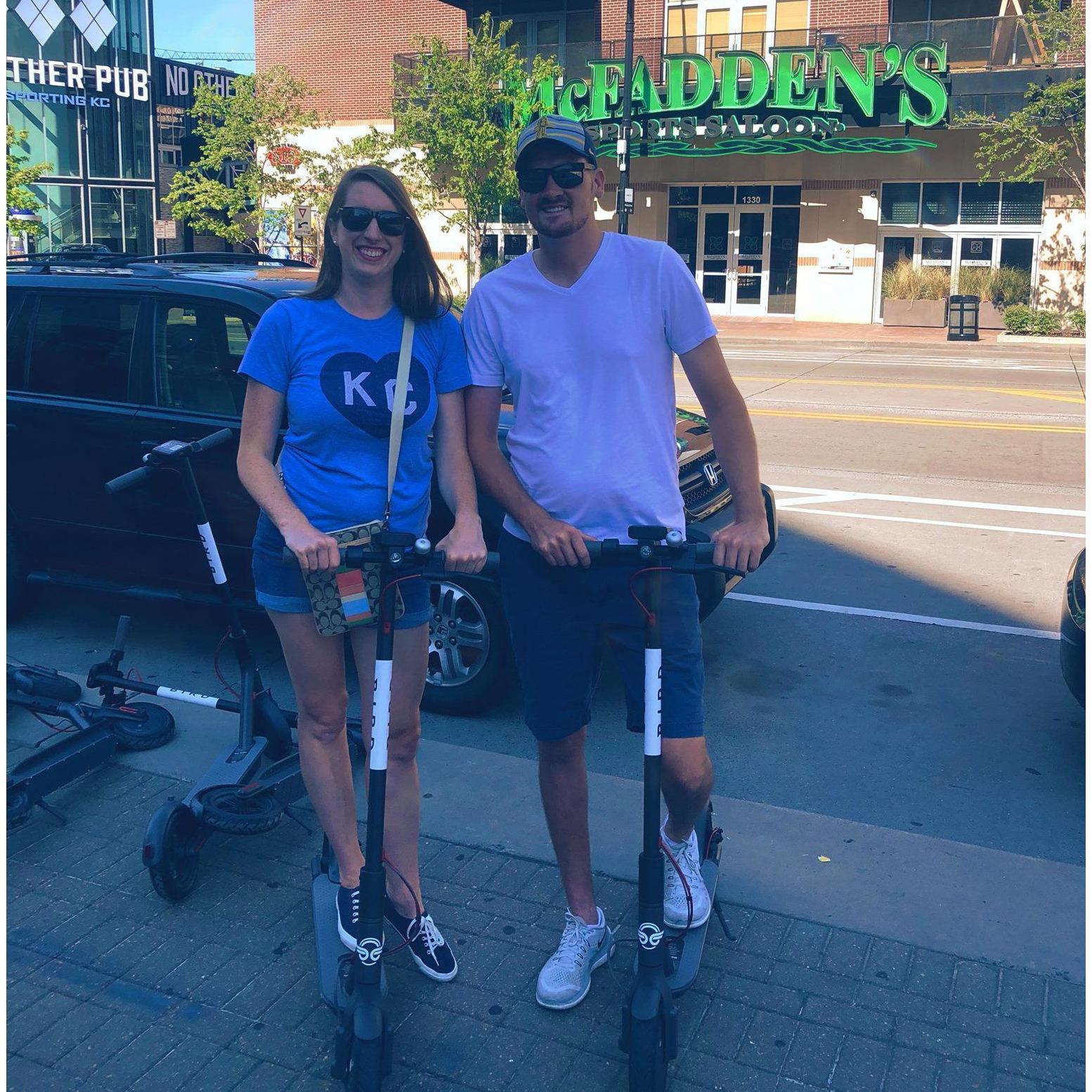 Riding scooters in downtown KC
