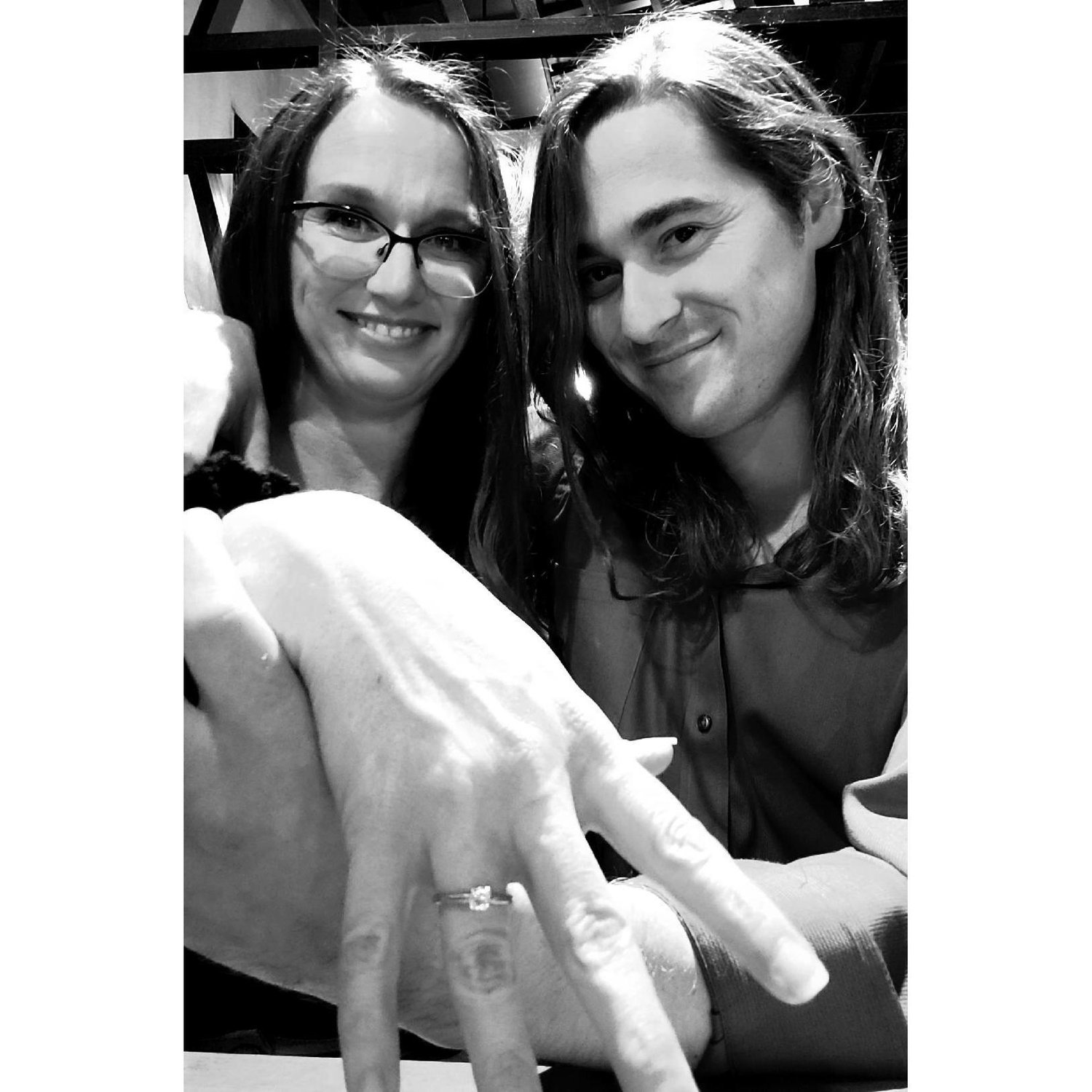 Celebrating our engagement at dinner!