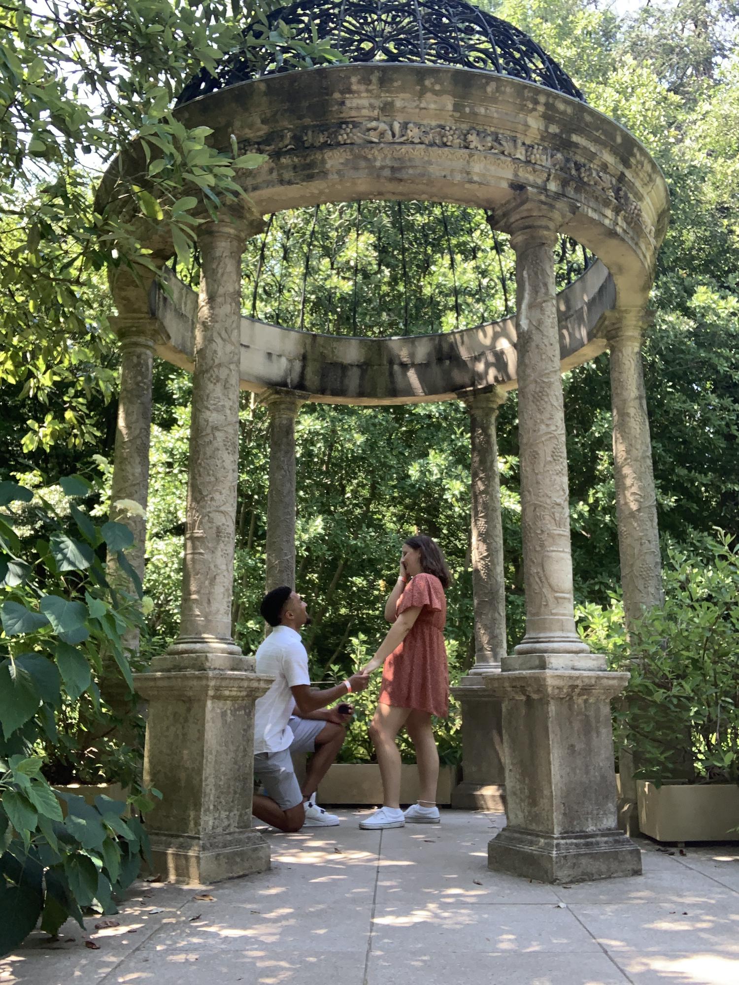 The moment Eric proposed! I set up my phone for a timer pic, and when I ran back for the picture, Eric got down on one knee and asked me to marry him!