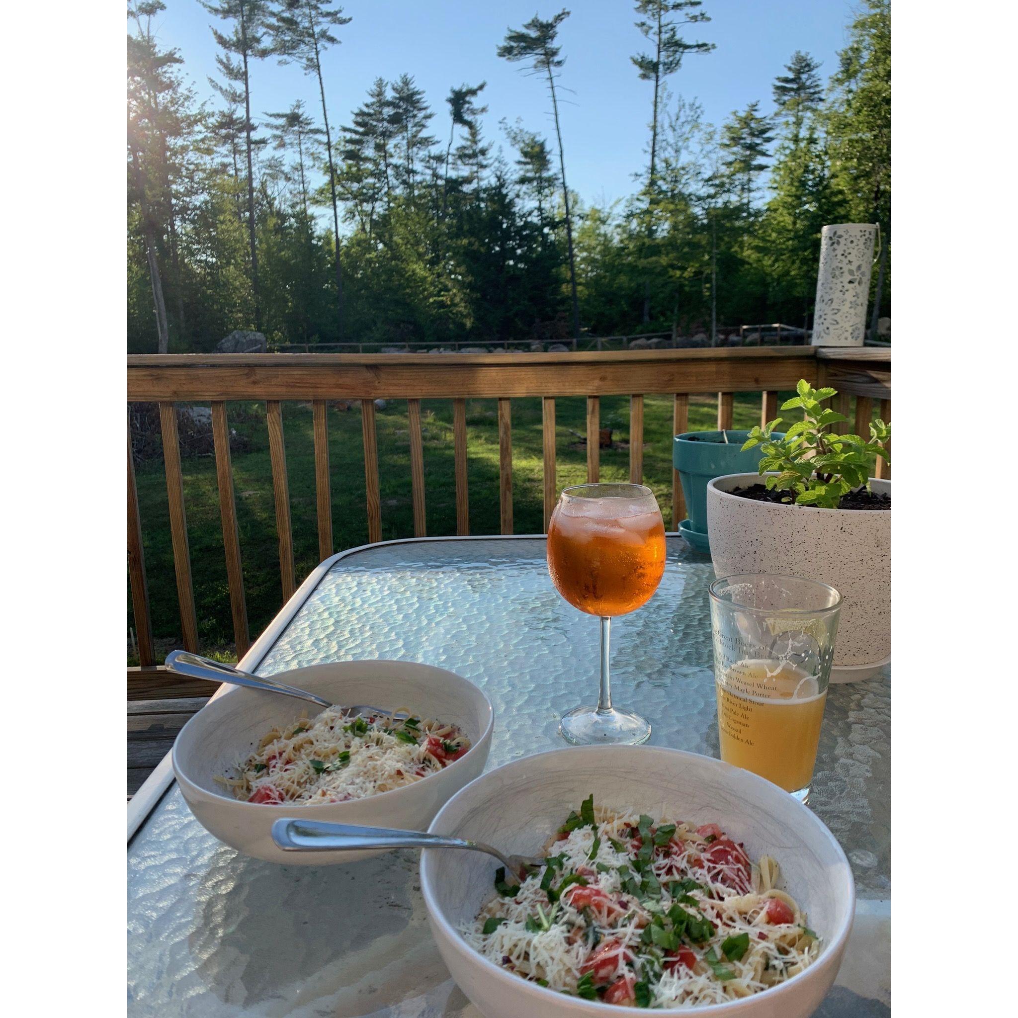 Enjoying dinner in the peace of our own back yard