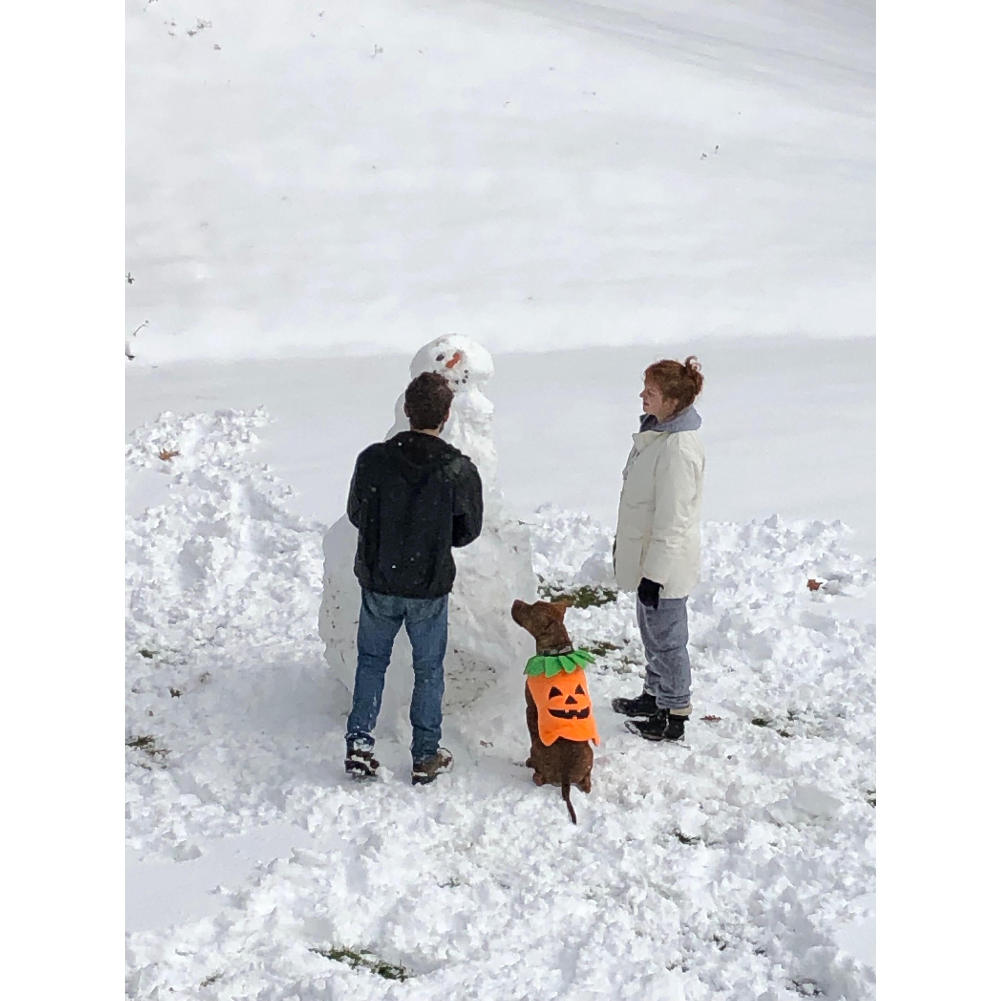 Building a snowman for Christmas with our son Bean, who dressed for the wrong holiday!