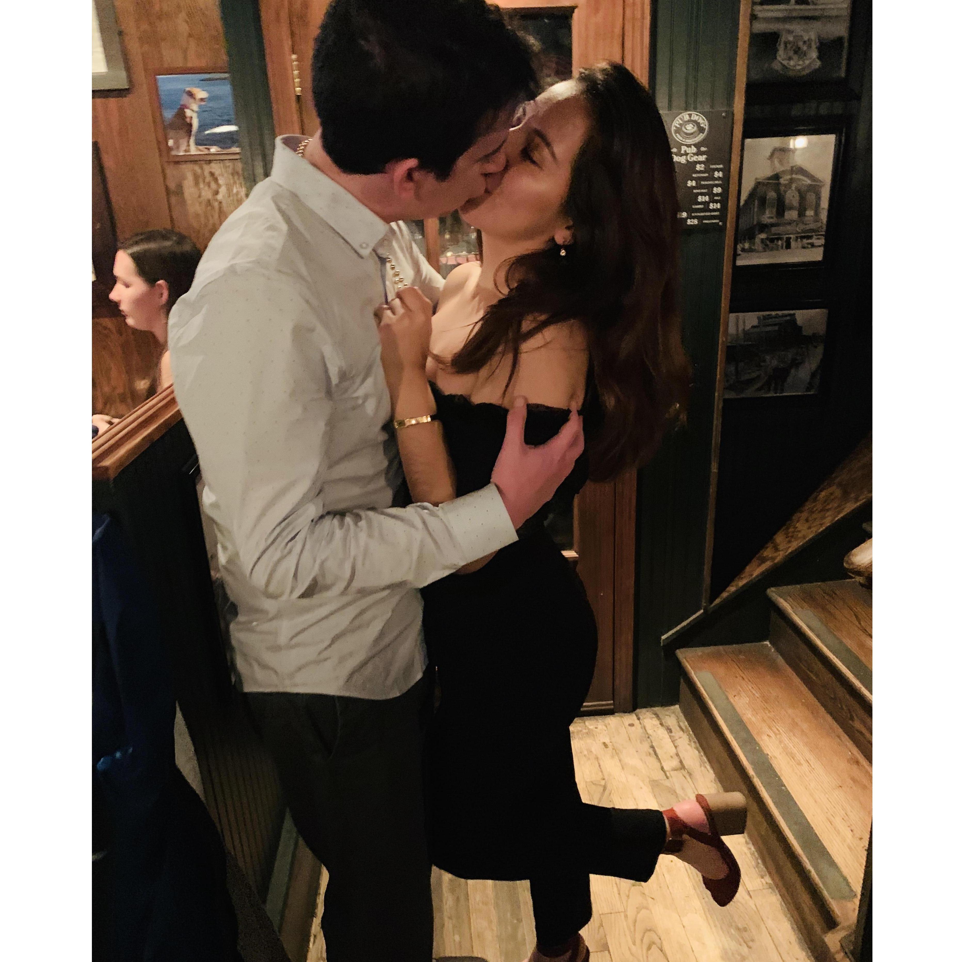 Sharing a passionate kiss at their yearly NYE festivities in Downtown Baltimore!