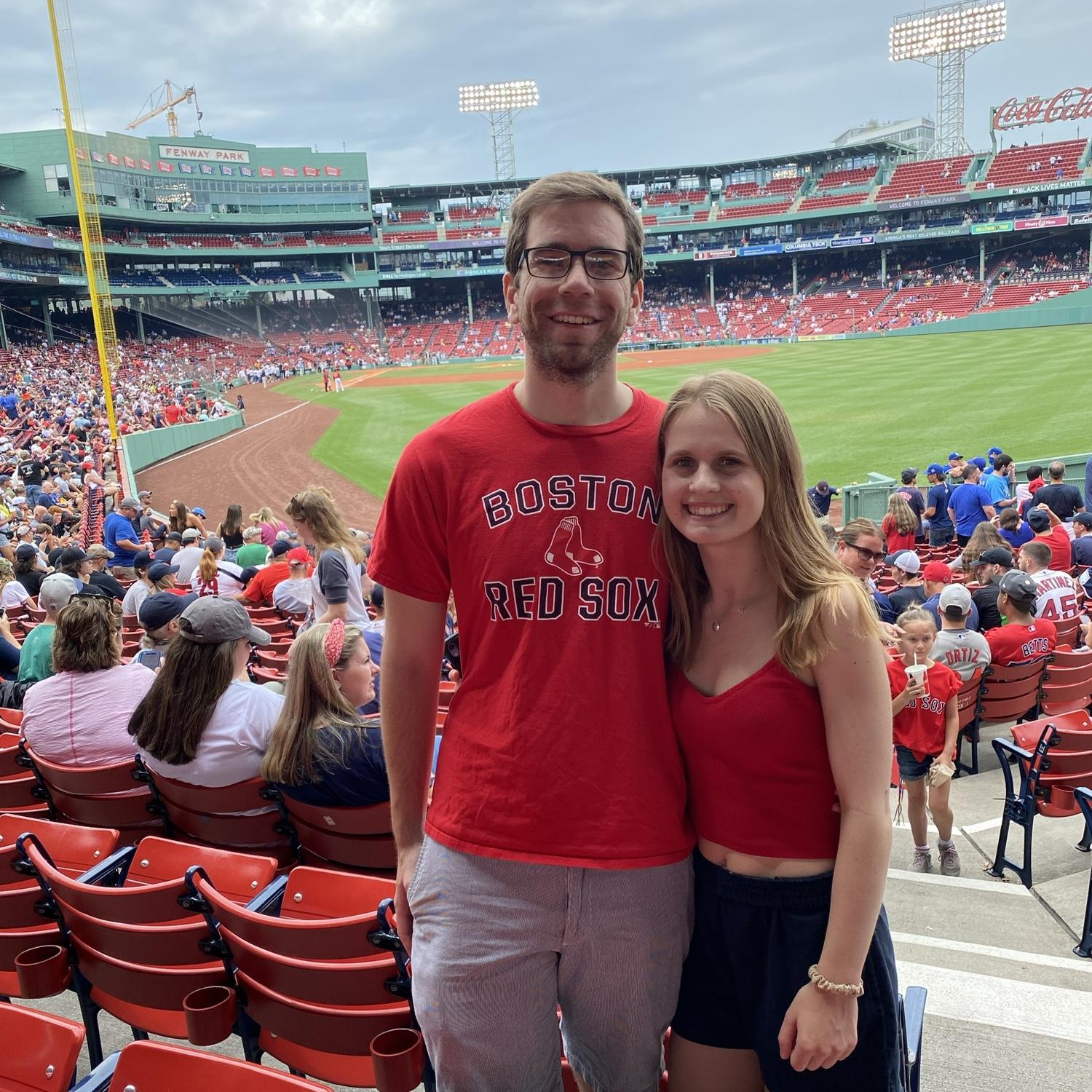 Juliet and Jon love cheering on Boston sports teams together. In the summer months, they particularly enjoy Red Sox games with friends!