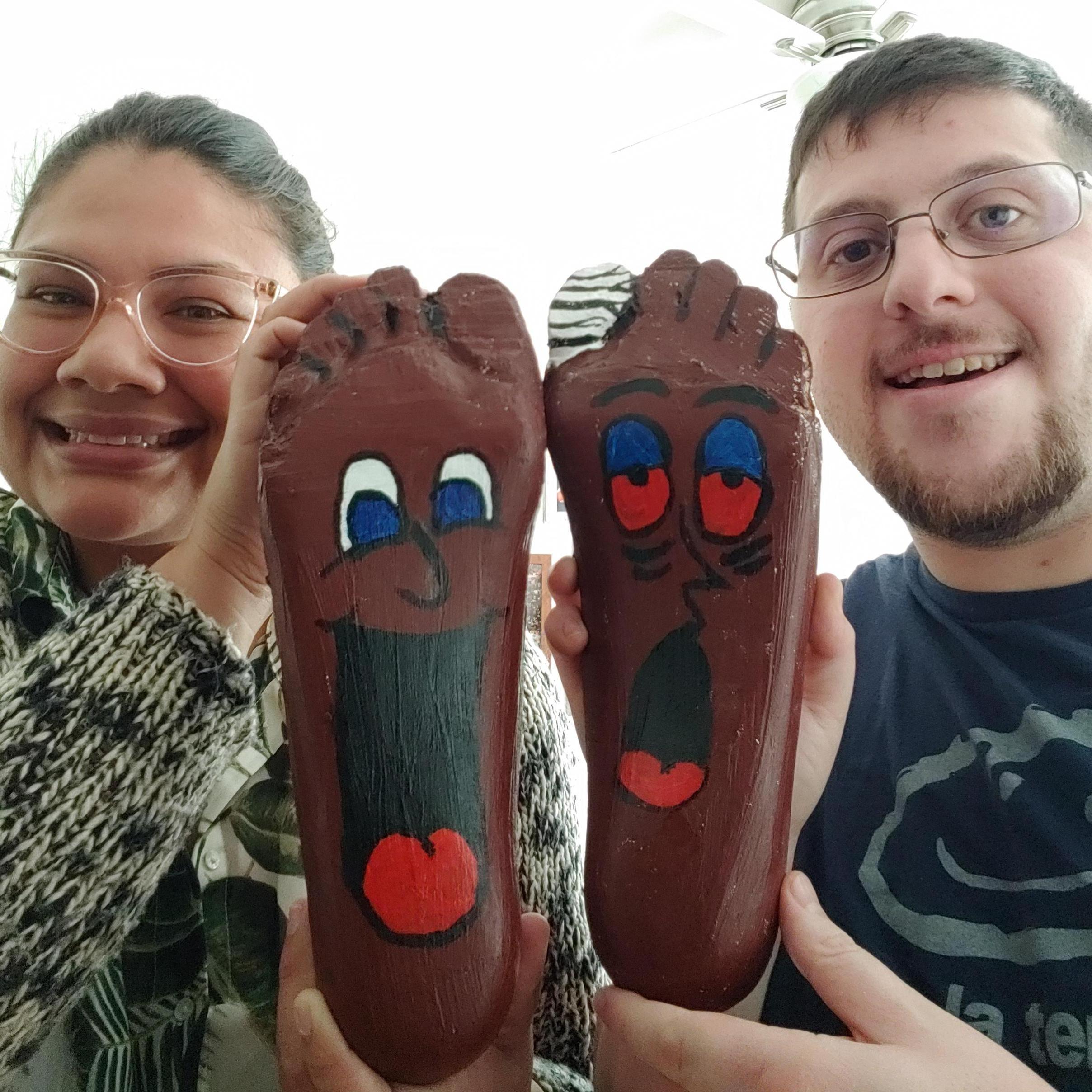 Got a pair of our friend Jon Schroeder's plaster foot molds that he gave to Harri.  So we decided to make them look like the logo from the Happy Foot Sad Foot Clinic that used to be in Echo Park!