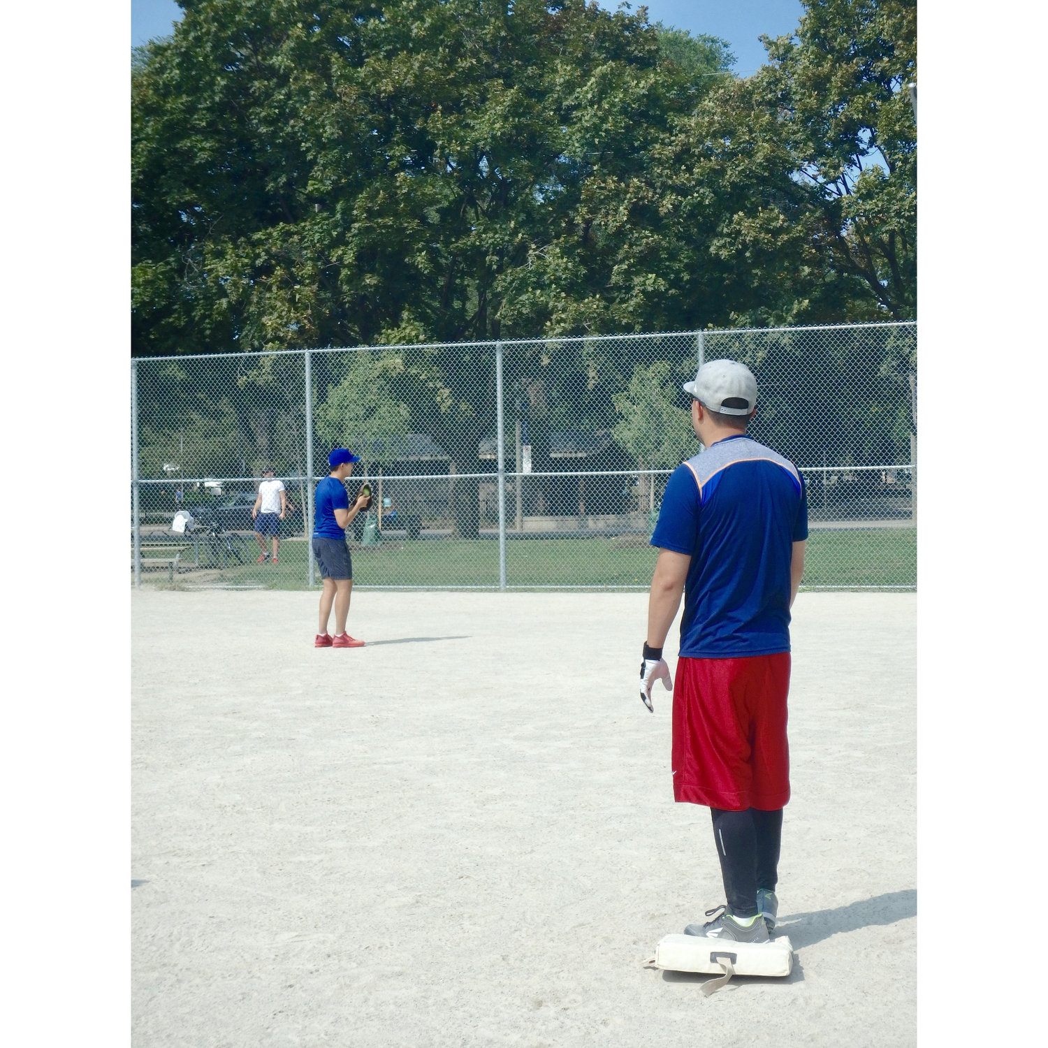 Playing softball in the spring in downtown Toronto.