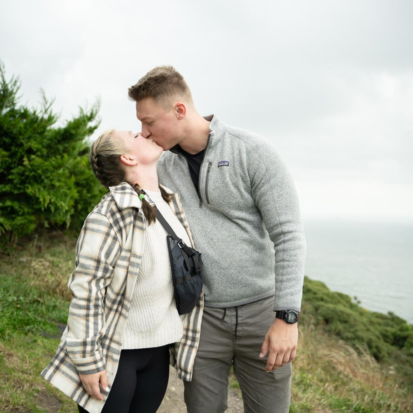 Our impromptu engagement photo session thanks to the lovely photographer who took our pictures after watching us get engaged