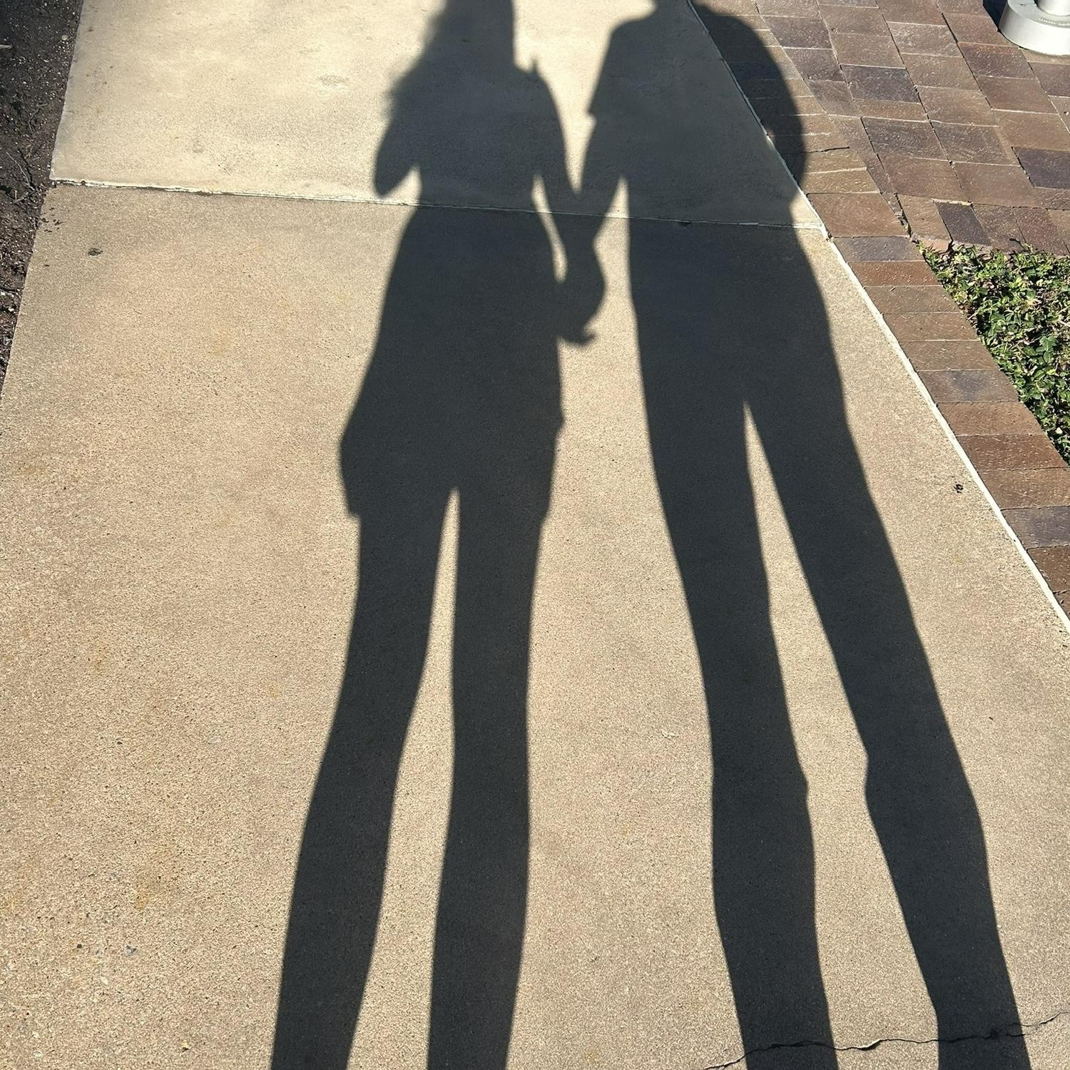Lexi snapped this shadow selfie on 8/14/24. We had just gone ring shopping and confirmed our jobs were bringing us HOME To Ohio - one of the happiest days