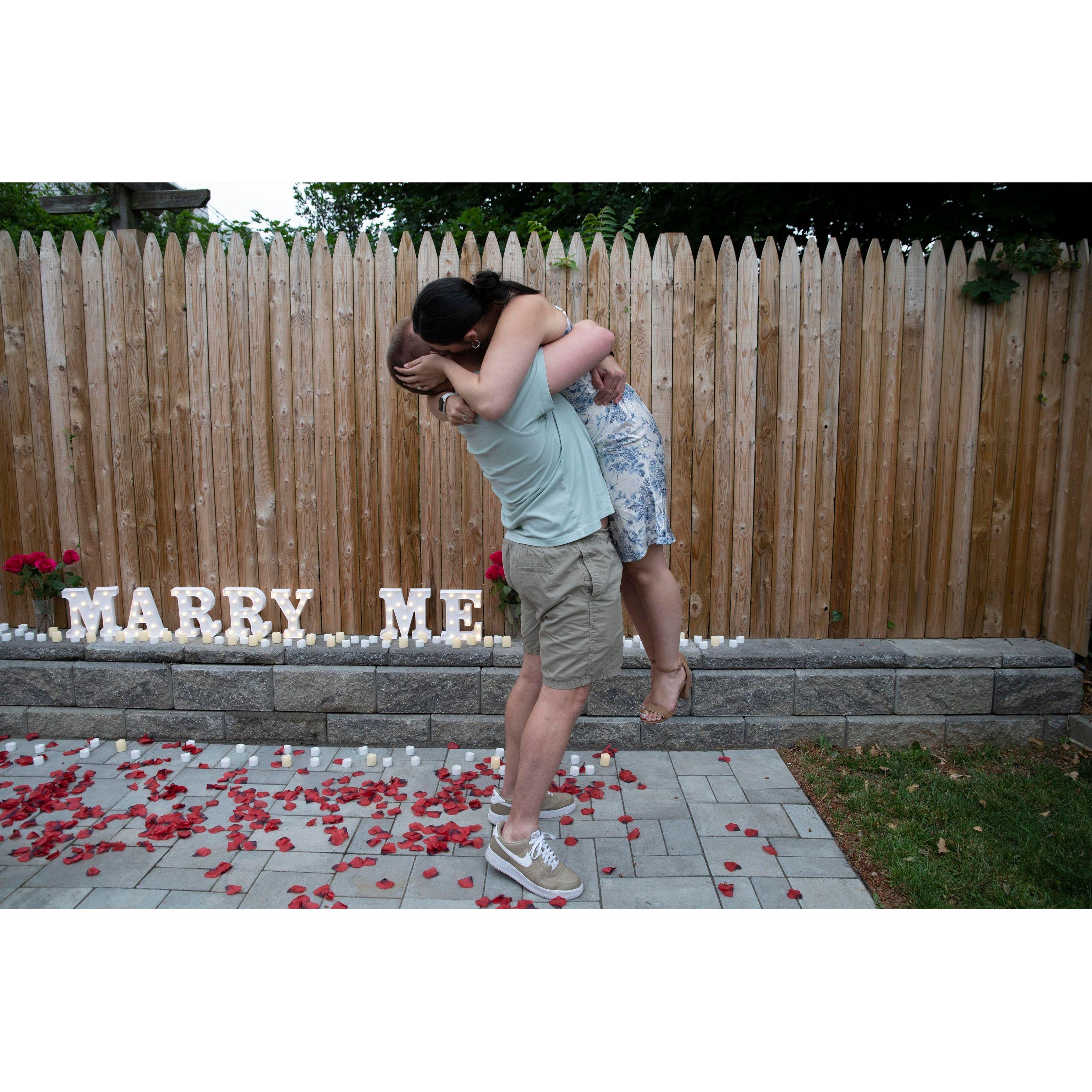 Believe it or not Sarah still asked what was going on despite the sign that said "Marry Me"
