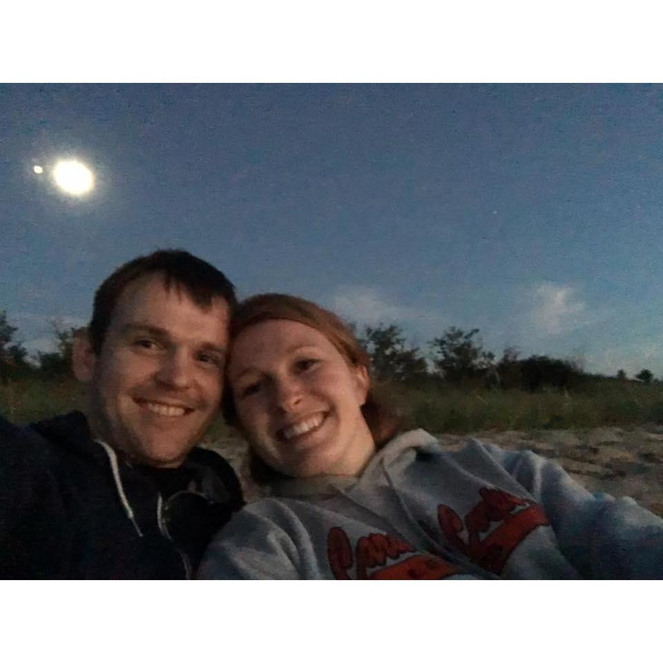 It took over a year, but in August 2016 Theresa finally got Aleksander to visit MI (where he was convinced of how awesome it is). Here they are at Good Harbor Beach at Sunset!