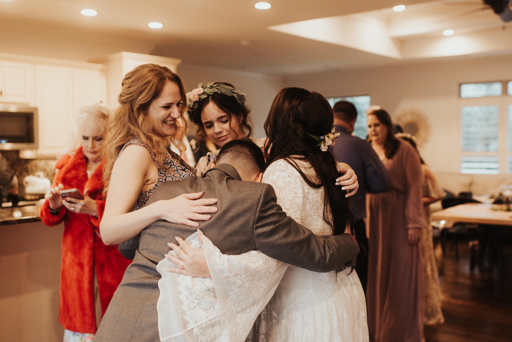 Group hug for Kaitlin, Michael, and Myah