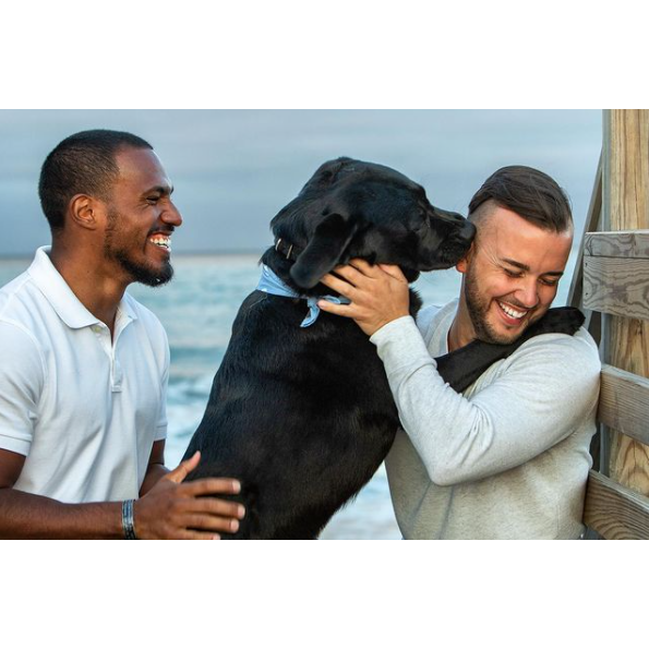 After taking family photos during a trip with Erich's family to the Outer Banks, the photographer snapped this treasured candid!