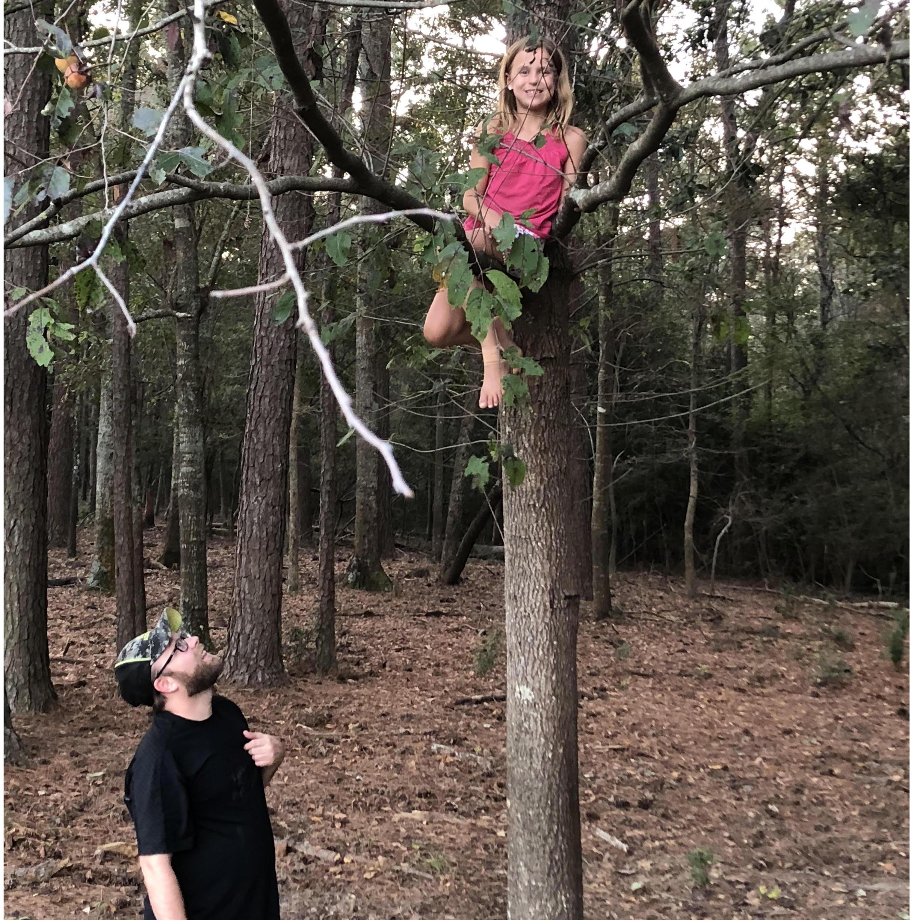 Uncle Cody and Amelia just climbing trees